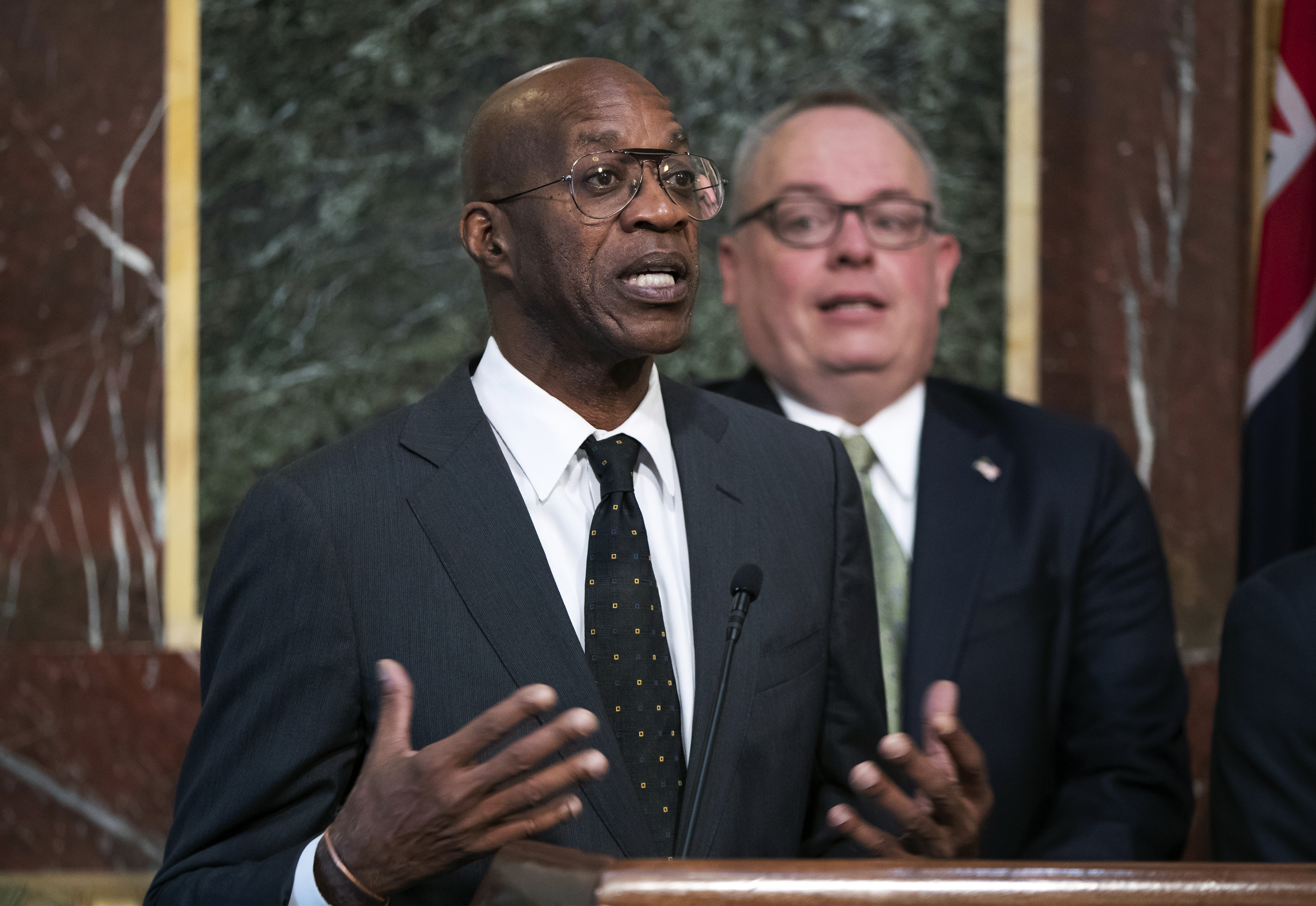 FILE - Edwin Moses, Chairman of the US Anti-Doping Agency, speaks at a press conference during a White House event to reform the World Anti-Doping Agency in Washington, October 31, 2018. Moses, US Gold Medalist Hurdler who played a key role in investigating Russian scandals , remembered how he tried to explain Moscow's point of view to anti-doping leaders. "One thing I always tried to get across to them was, 
