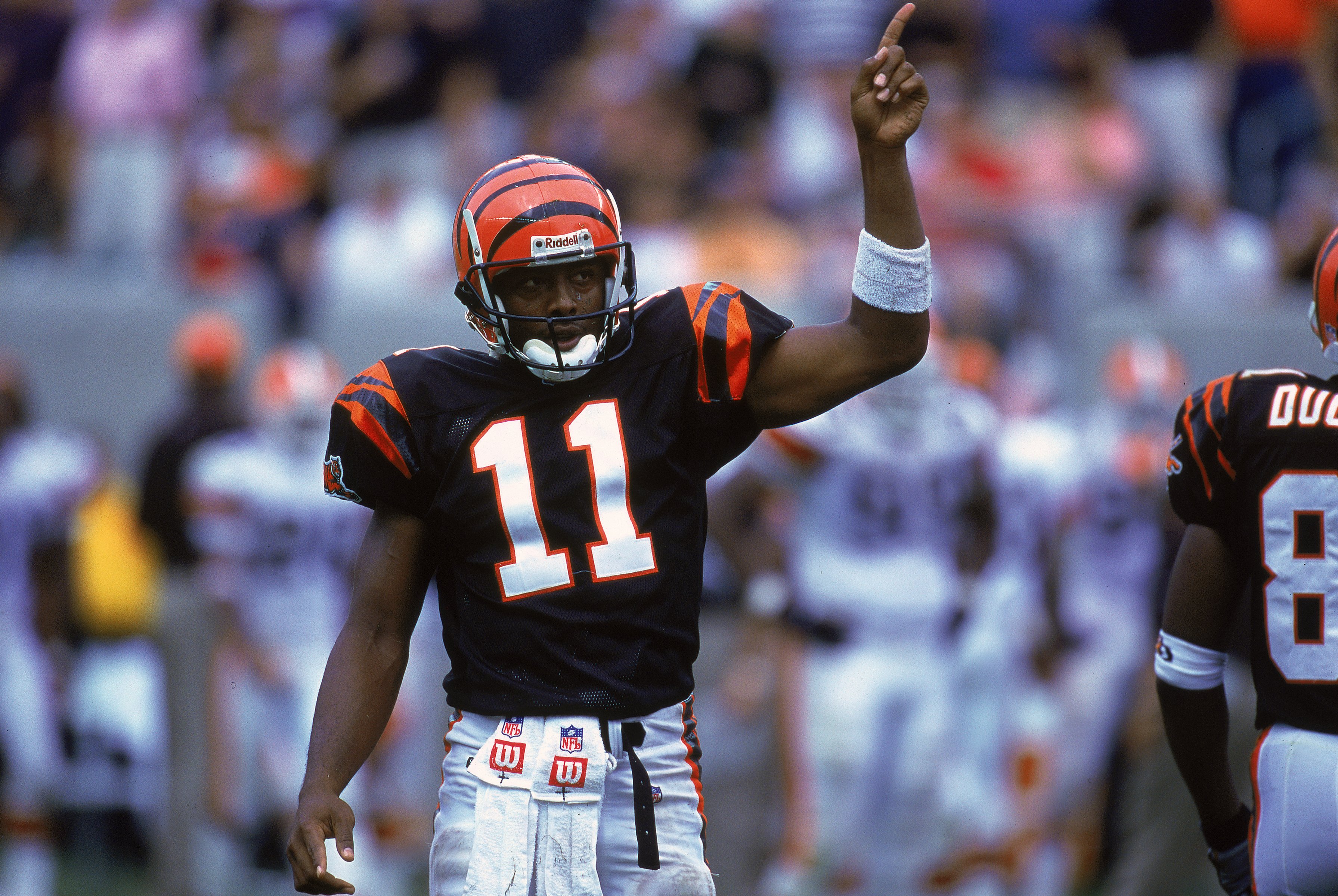 Cincinnati Bengals running back Rudi Johnson points to a group of