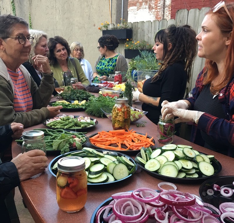 Lily s Bistro owner Emily Mendenhall (far right) and bar manager Amber Brady at Lily s Bistro s Garden Party in September. ALEXIS LARSEN/CONTRIBUTED