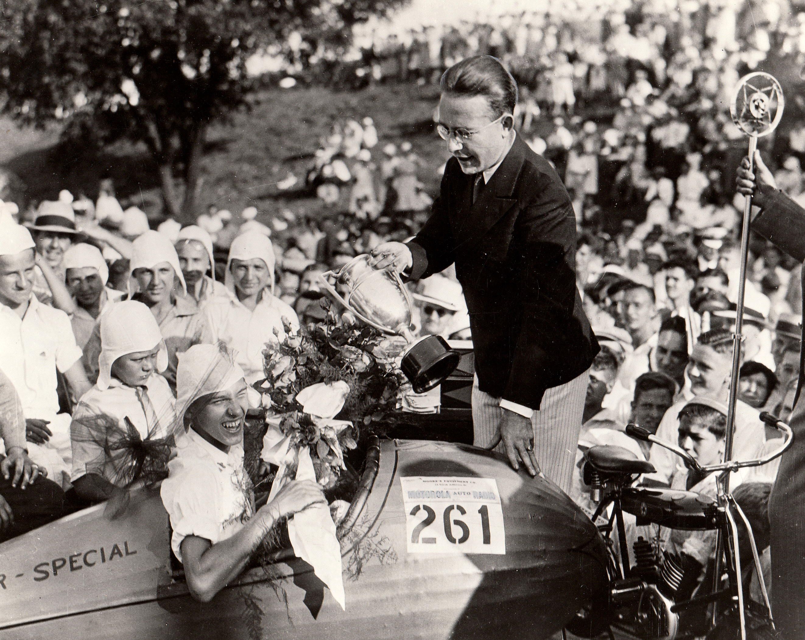 Myron E. Scottie Scott was a Dayton Daily News photographer in 1933 when he came across of group of boys racing homemade coasters. That chance meeting turned into the very first Soap Box Derby race. Its estimated more than 40,000 people lined Burkhardt Avenue for the event. The young faces watching Scottie award the inaugural loving cup sum up the excitement of that day. DAYTON DAILY NEWS ARCHIVE