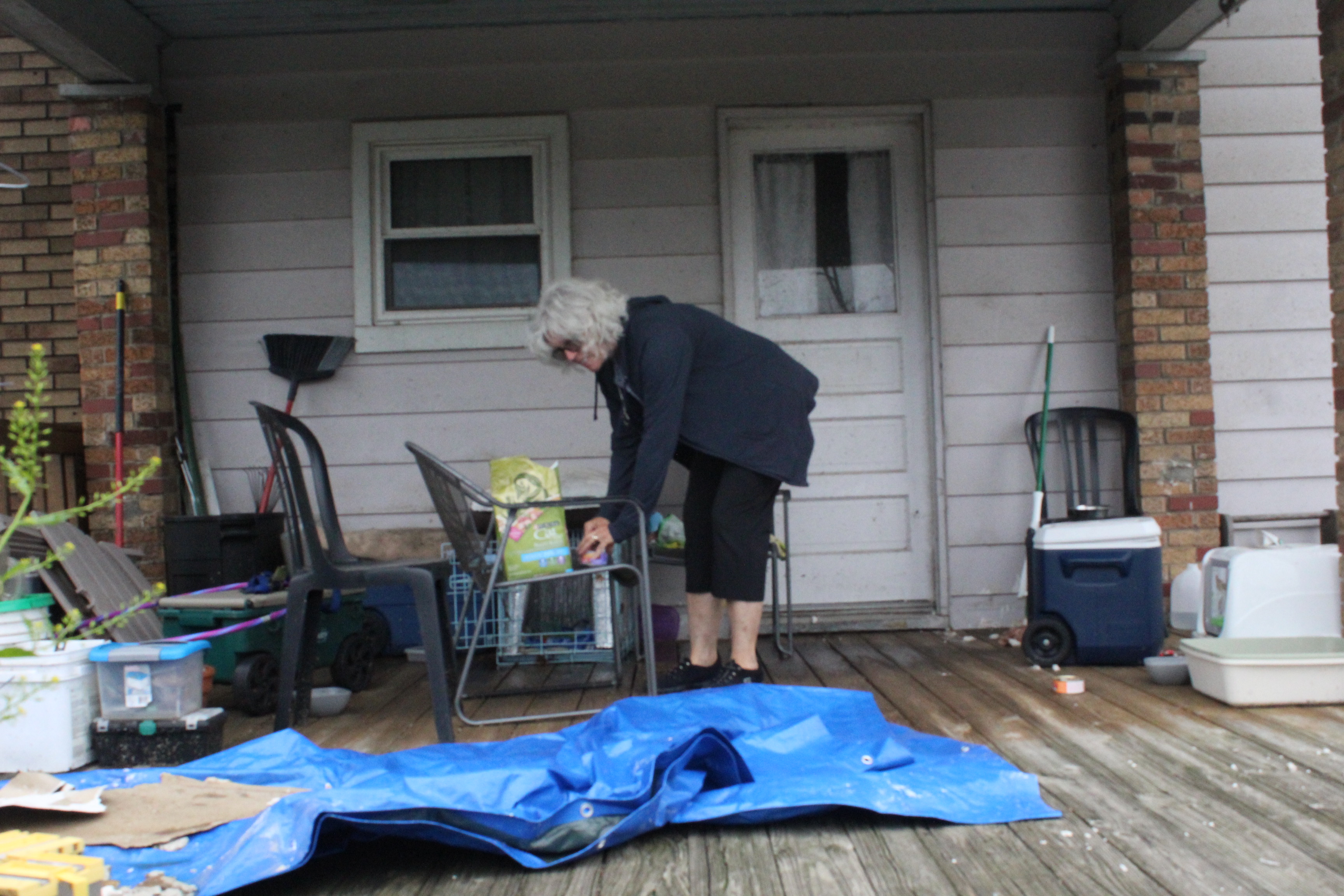 Robin and Chris Sassenberg house and cottage was damaged during the Memorial Day tornadoes. Robin returns to the house daily to feed her cat Slim Shady who has been missing since a tornado hit the home.