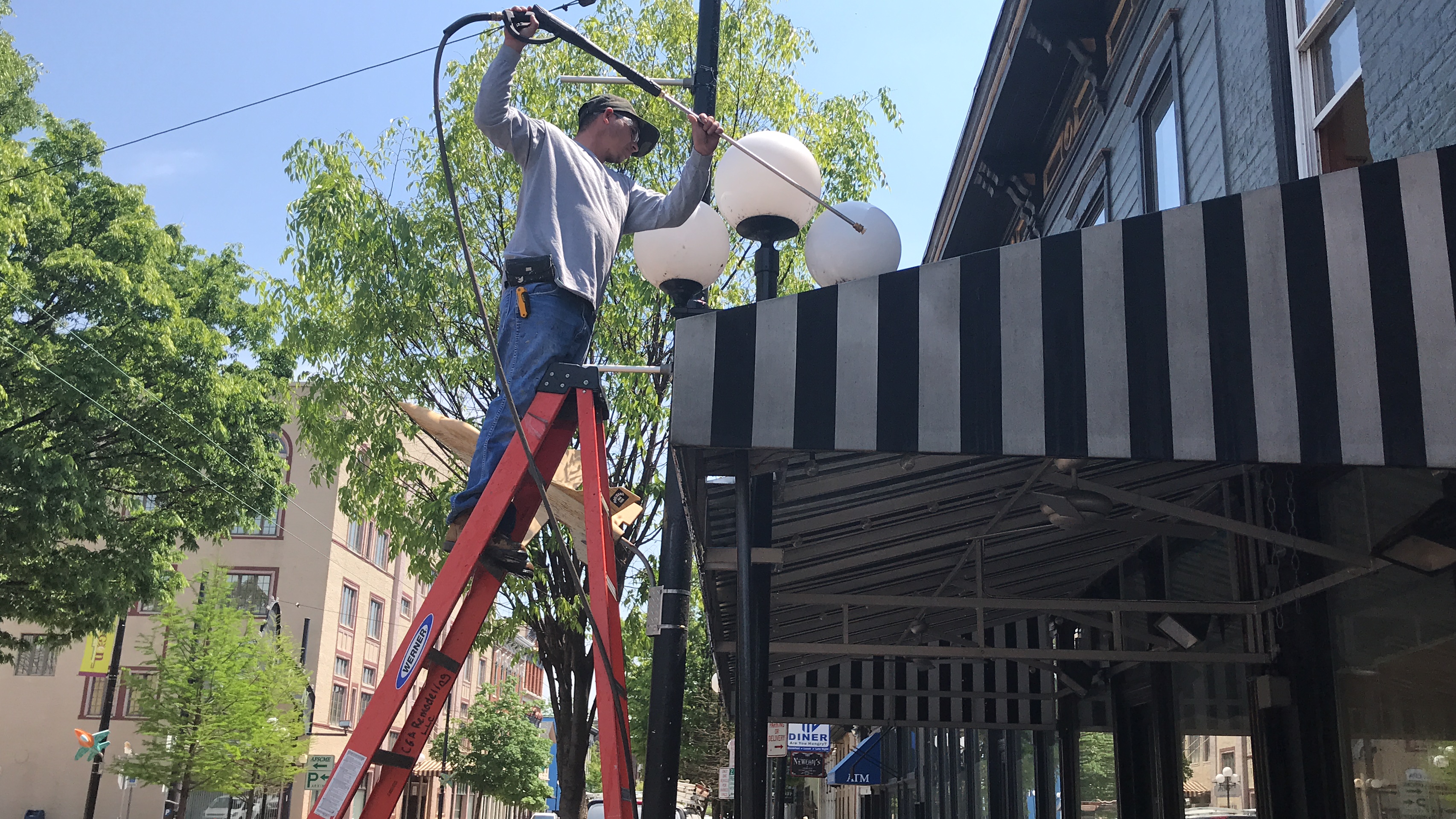Salar Restaurant and Lounge is being rehabilitated after a fire Dec. 29, 2017. A worker is show doing work on the outside of the restaurant.