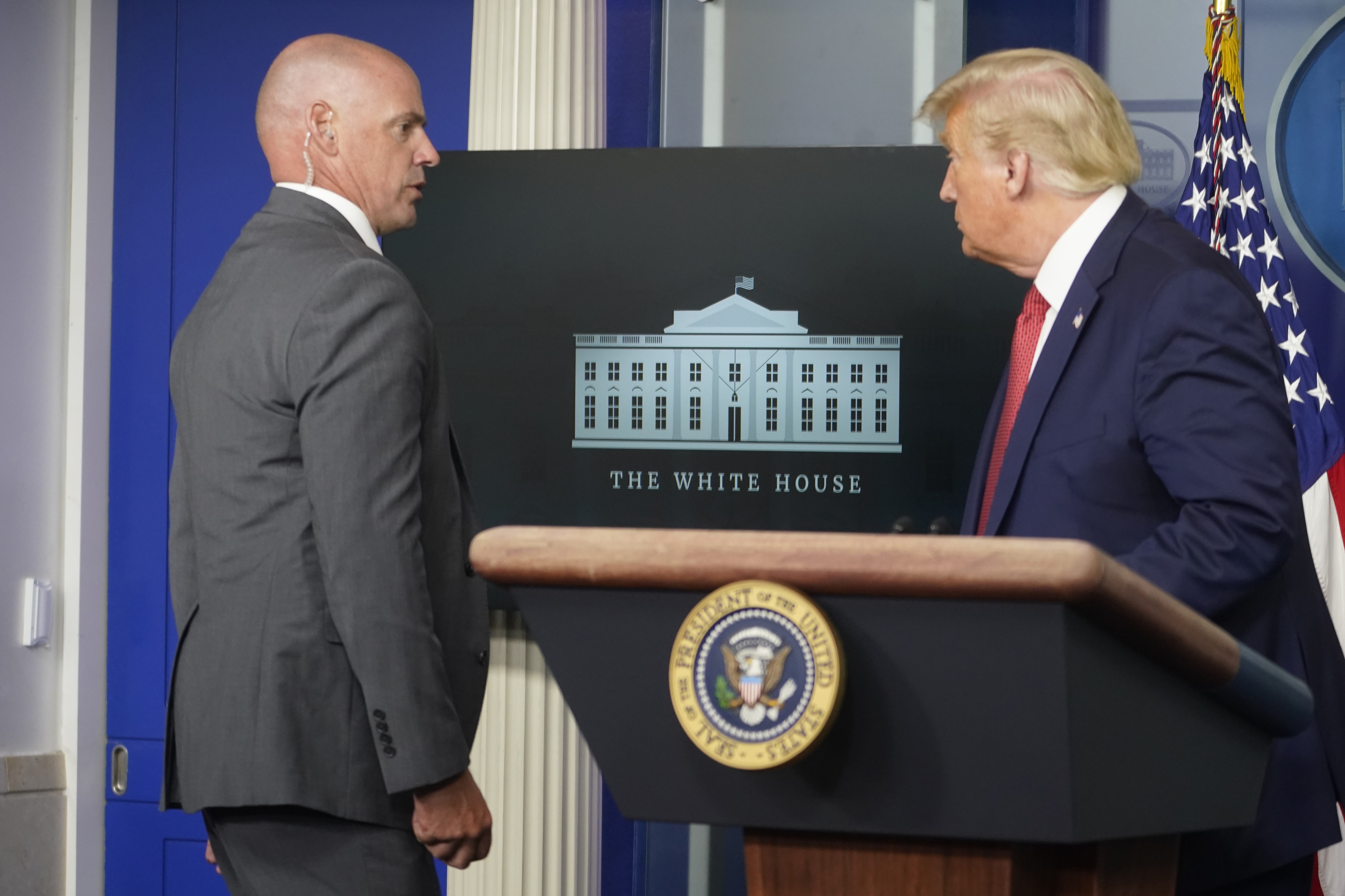President Donald Trump departs a news conference at the request of the Secret Service at the White House in Washington, Monday, Aug. 10, 2020. President Trump returned shortly thereafter and said there had been a shooting near the White House. (Doug Mills/The New York Times)
