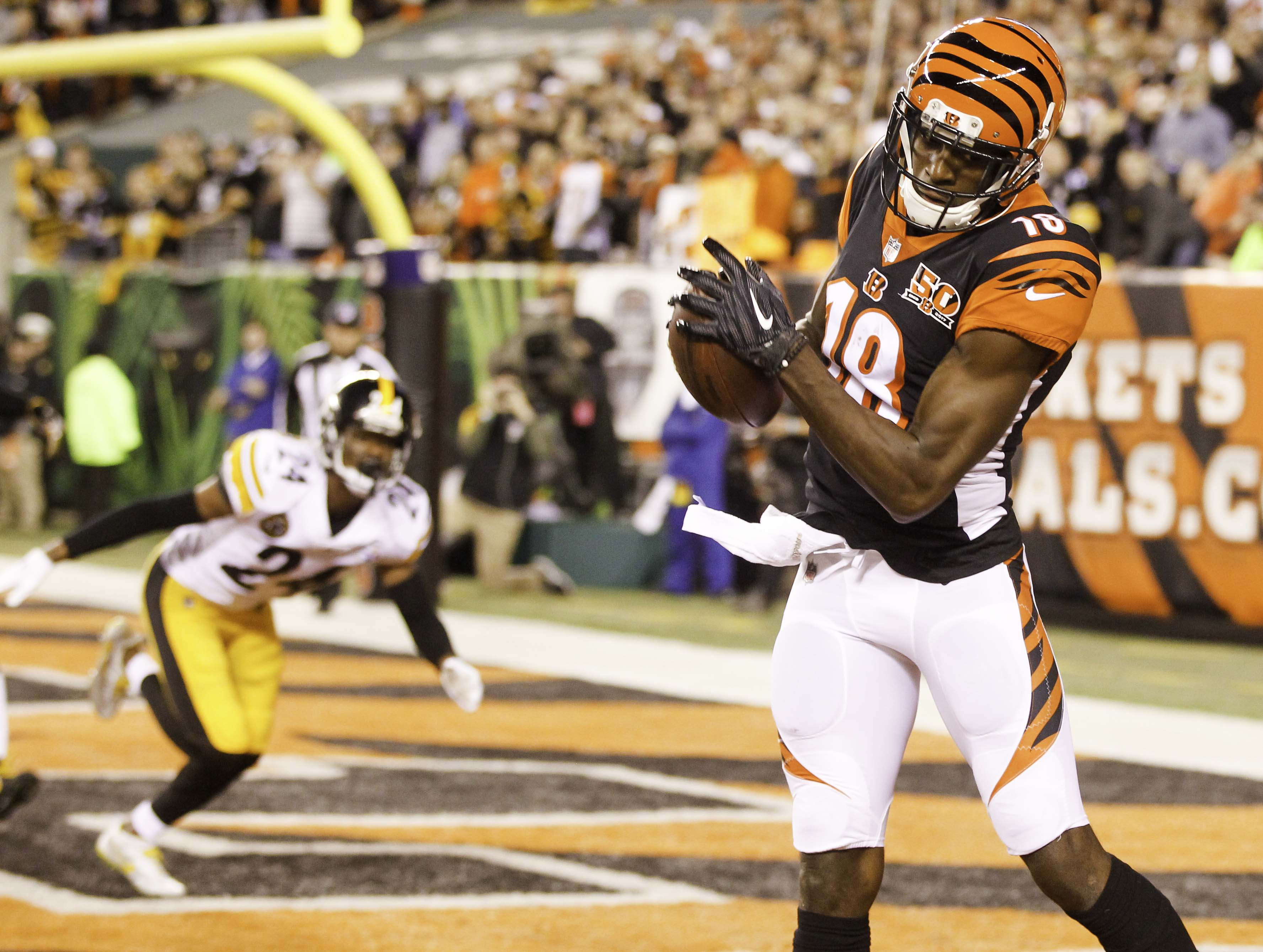 Bengals wide receiver A.J. Green (18) catches a touchdown pass during the first quarter of their game against the Steelers, at Paul Brown Stadium, Monday, Dec. 4, 2017. GREG LYNCH / STAFF