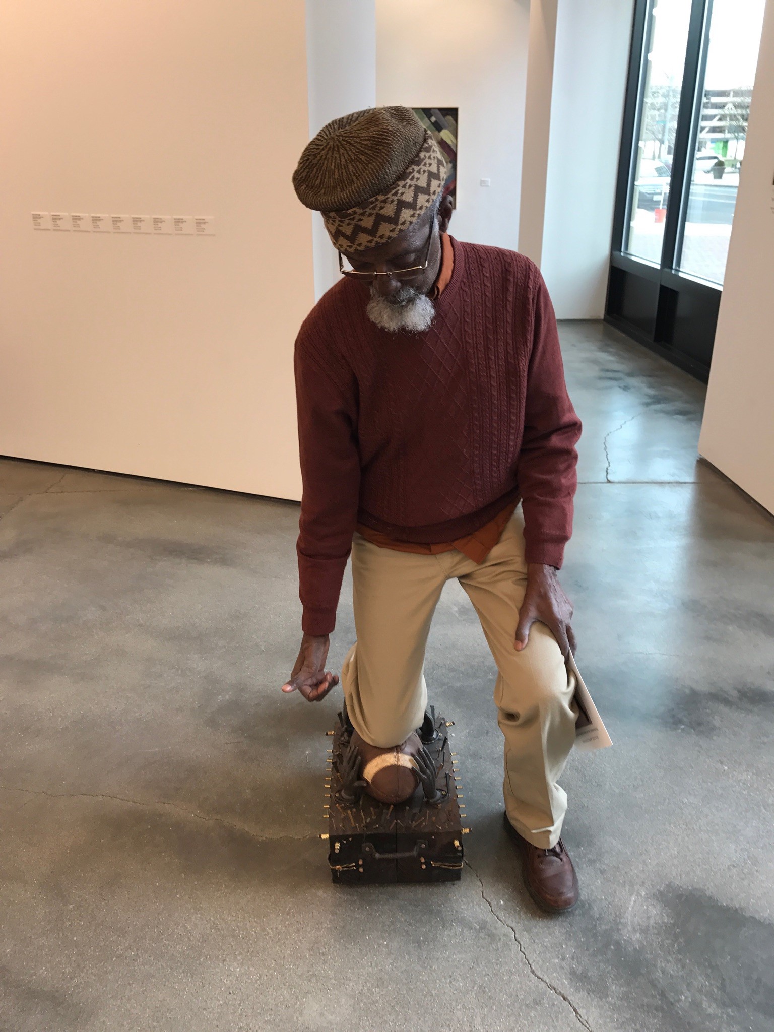 Bing 5 & Bing 6 -- Internationally acclaimed Dayton artist Bing Davis -- once a high school and college basketball & track star -- takes a knee on one of his kneelers in his exhibit "Kneel" which ties together the silent protests of Colin Kaepernick and the murder of George Floyd. Tom Archdeacon/STAFF