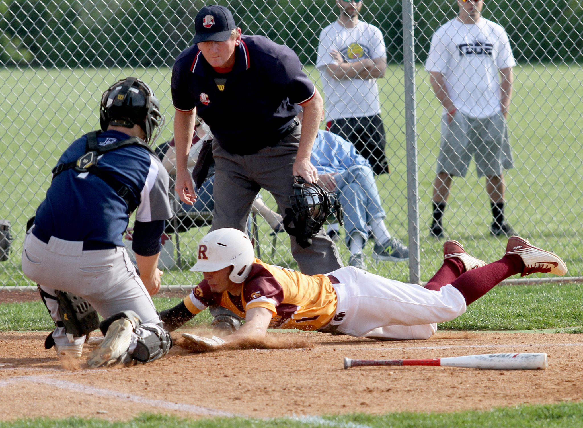 Andrew Beebe of Ross is tagged out at home by Edgewood catcher Chase Gingrich during Wednesday’s game in Ross Township. CONTRIBUTED PHOTO BY E.L. HUBBARD