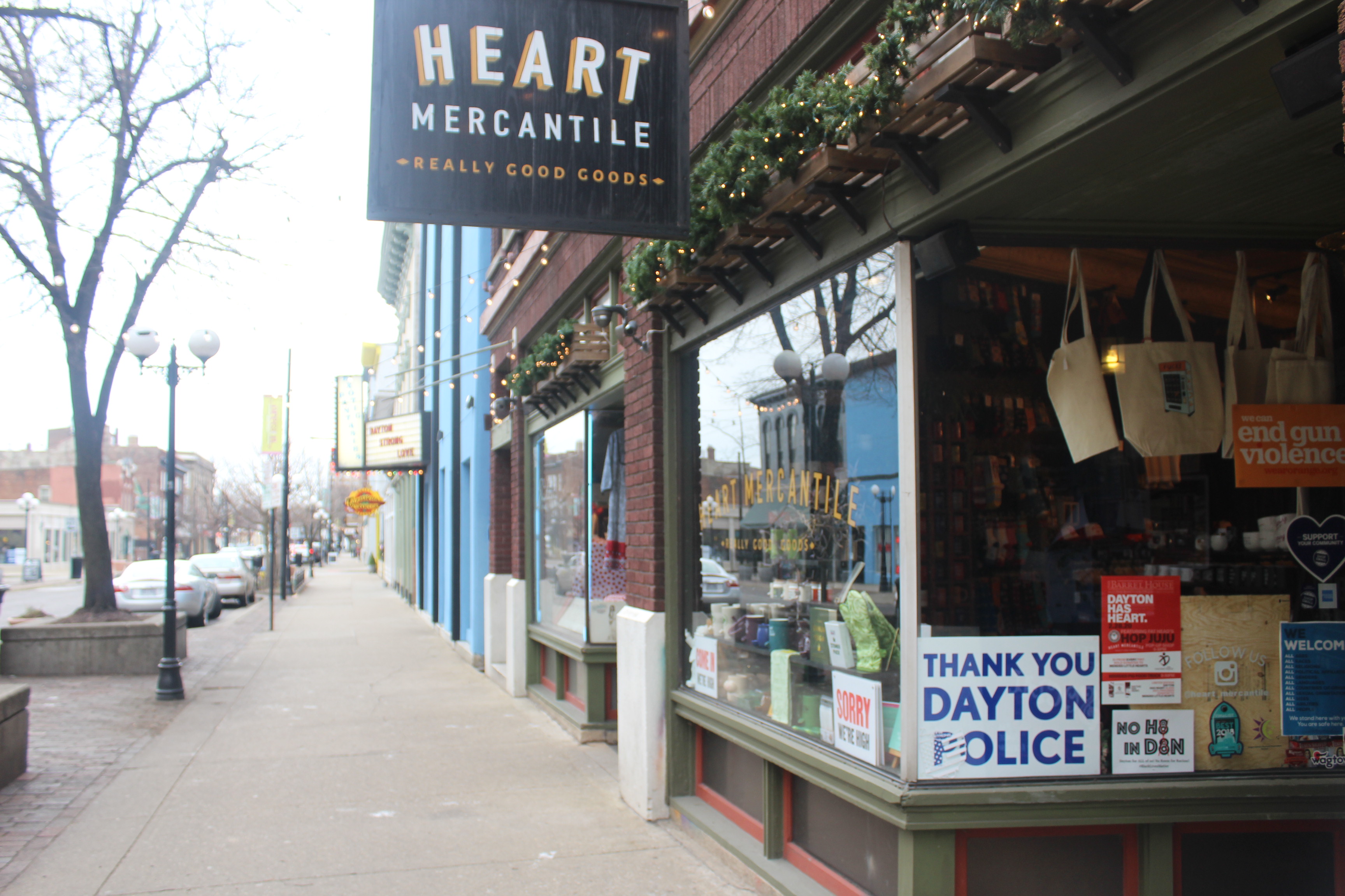 Six months after a 24-year-old Bellbrook man killed nine people in the Oregon District during the worst mass shooting in Ohio history, literal signs of strength, appreciation, resilience and the determination to “do something” about gun violence can be found throughout the historic neighborhood. Heart Mercantile displays a "Thank you Dayton Police" sign. AMELIA ROBINSON/STAFF