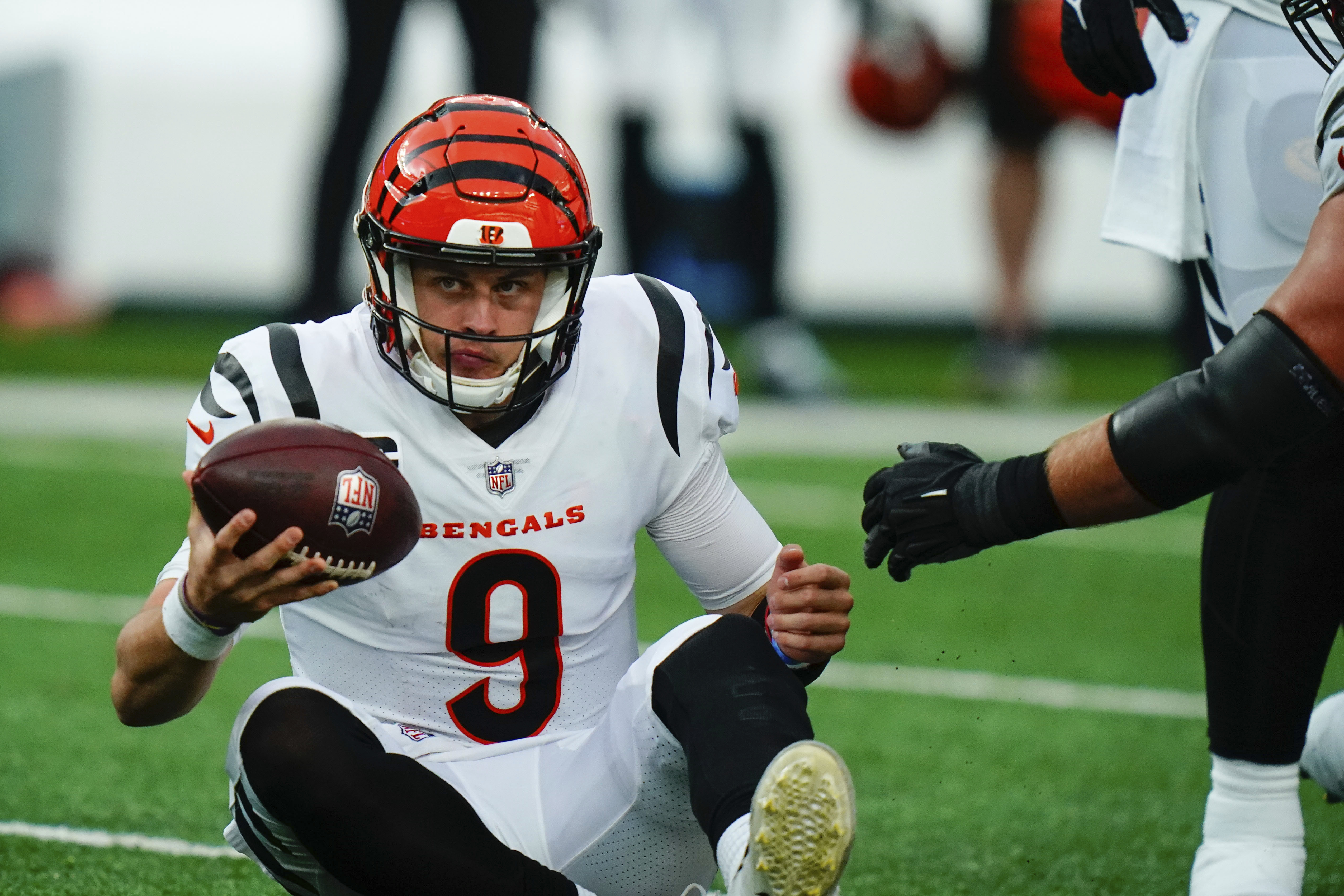 Cincinnati Bengals quarterback Joe Burrow reacts on sidelines to