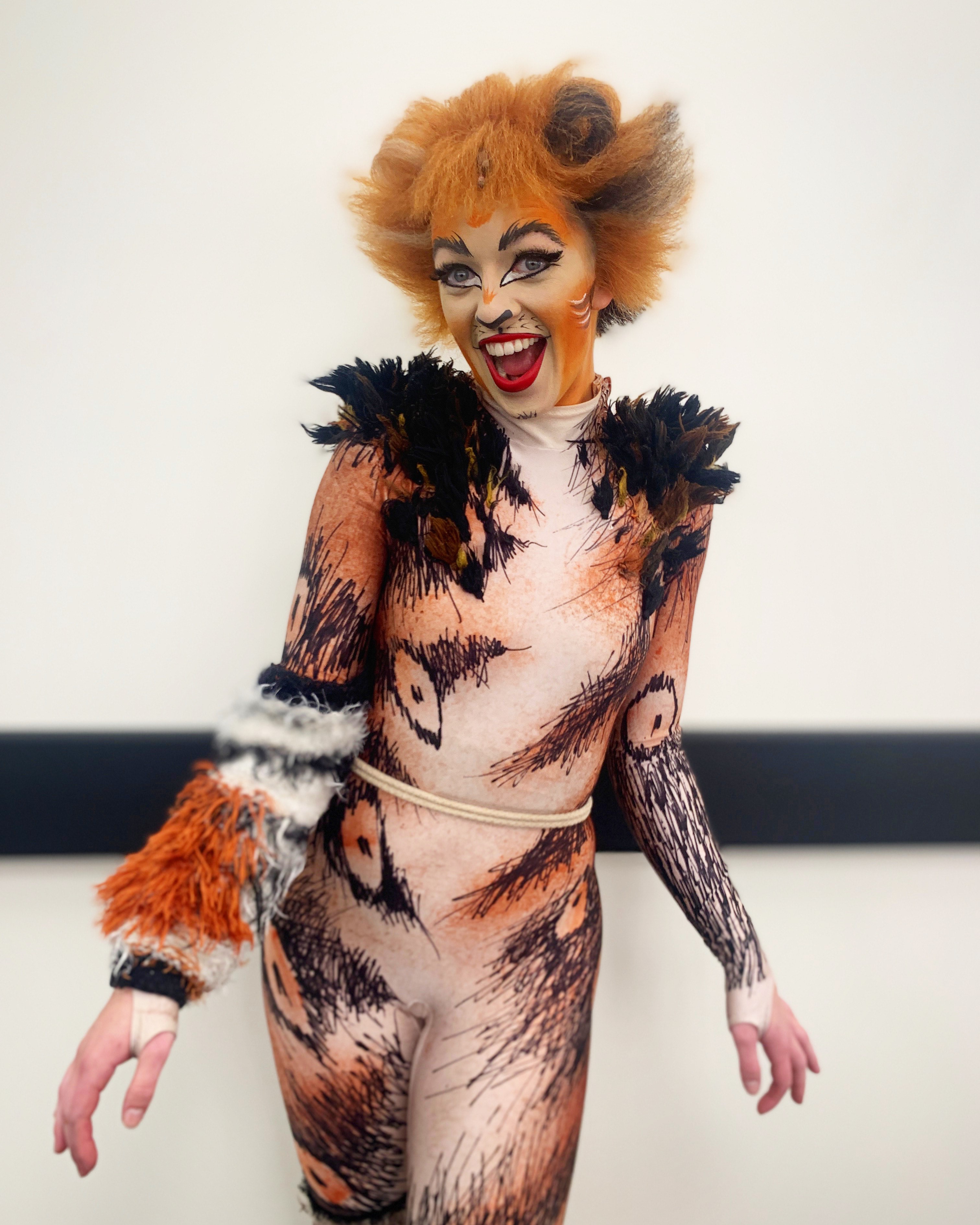 Wright State University graduate Megan Arseneau is touring with "CATS." Here, she is pictured as the Gumbie Cat, one of six roles she is covering. The show opens at the Shuster in Dayton on Tuesday. CONTRIBUTED