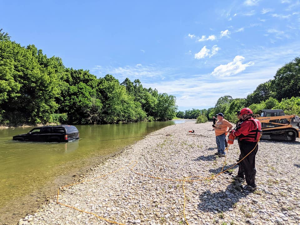 The Butler County Emergency Response Services team recovers a stolen vehicle from the Great Miami River Tuesday morning. BUTLER COUNTU SHERIFF'S OFFICE