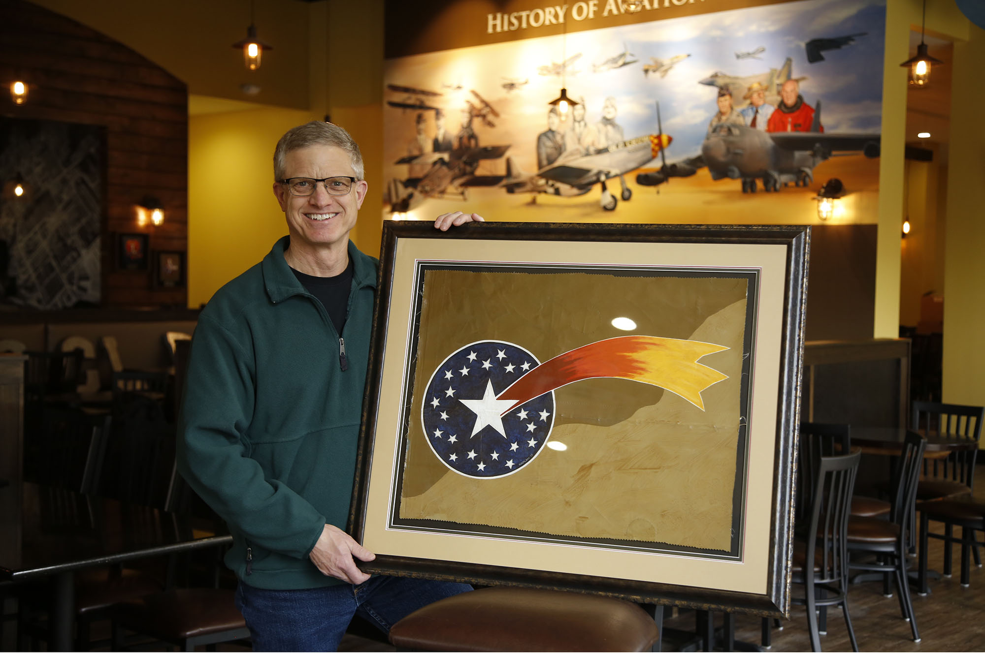 World War I Spad artwork reproduction by Ron Kaplan at the new Flyboys Deli in Beaverceek. TY GREENLEES / STAFF