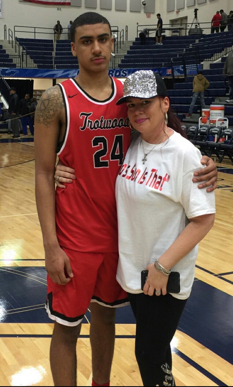 While a player at Trotwood Madison High, Torrey Patton embraces his mom, Conswela McLemore, who is wearing a shirt that proclaimed’ “Whose Son is That” It’s her favorite saying when Torrey does well. She’s said it a lot this season. CONTRIBUTED