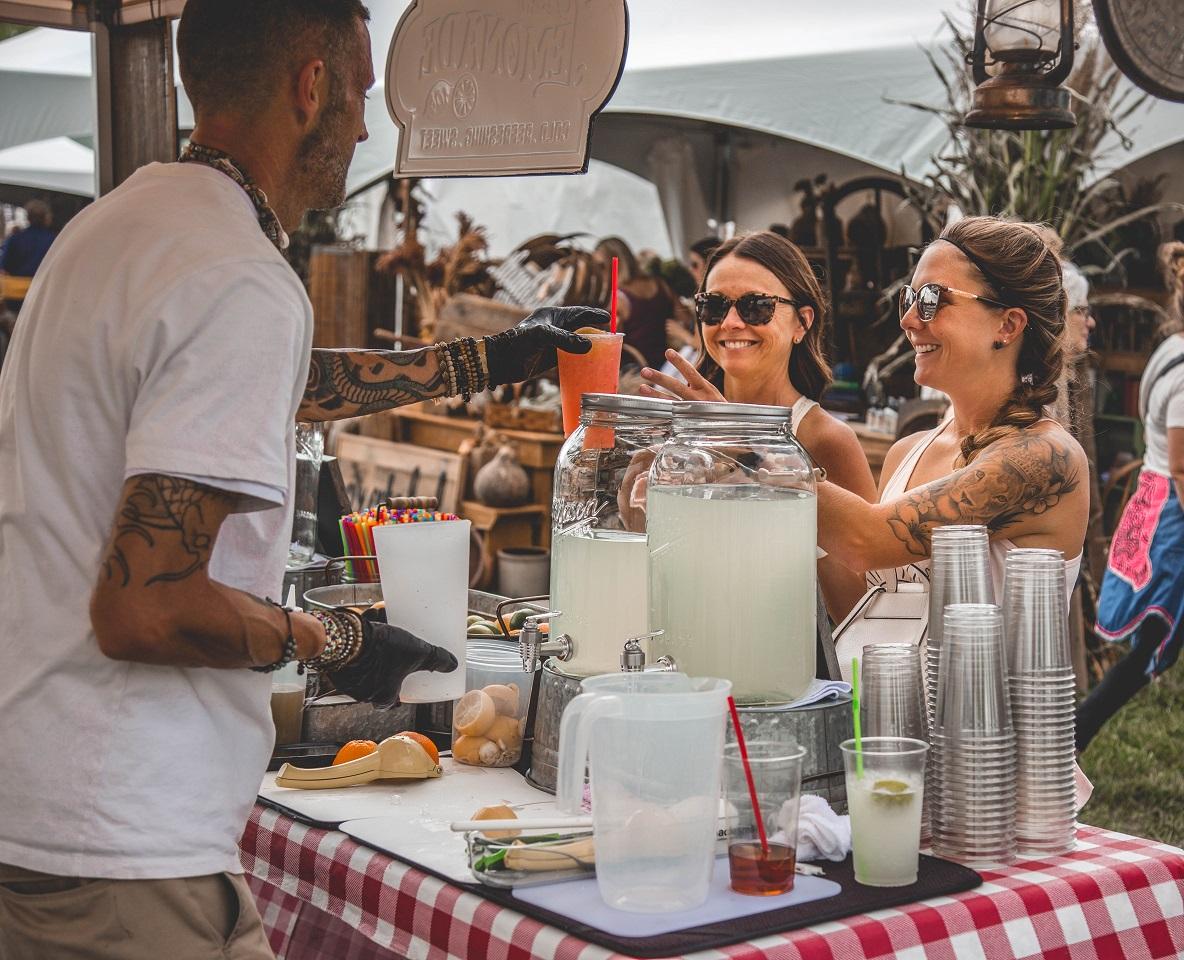 Guests enjoy Charm at the Farm Vintage Market. CONTRIBUTED