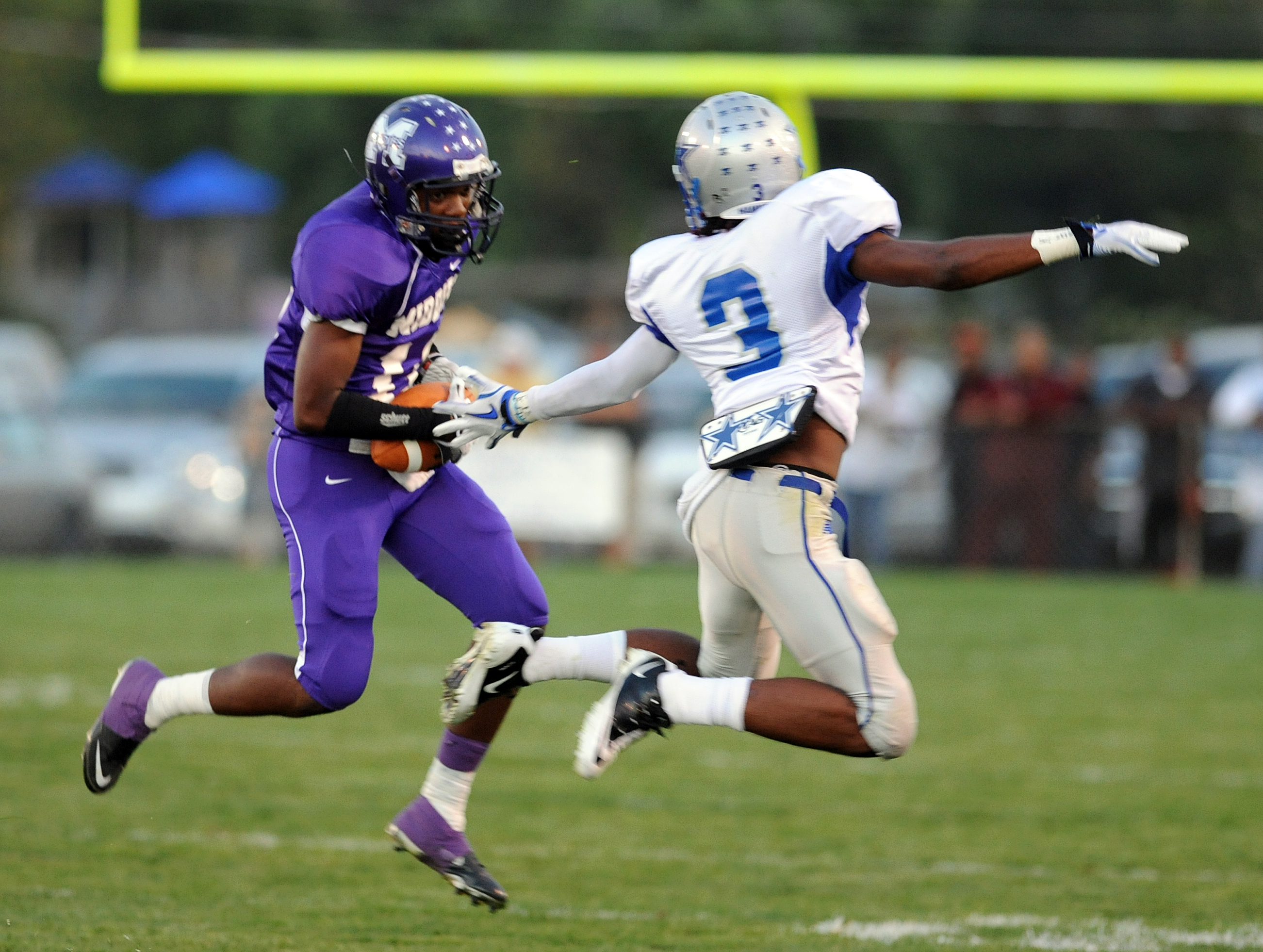 Middletown's Donte Holdbrook (left) catches a pass during a 2010 game against Hamilton.