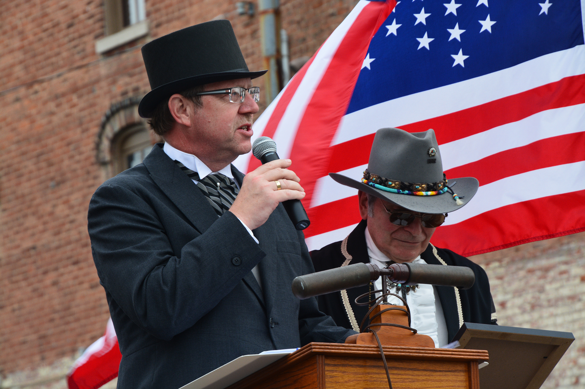 Tipp City Mayor Pat Hale (left) and resident Ron Re participate in the Tipp City 175th anniversary celebration during the 2015 July 4 weekend. The celebration sparked rebirth of expanded community July 4 activities that continue this year. CONTRIBUTED
