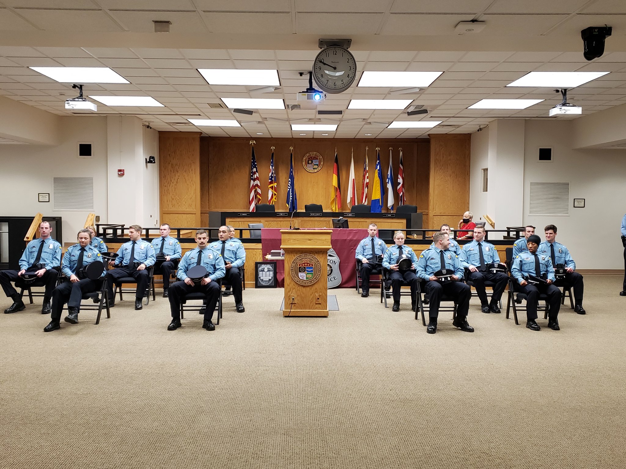 A photo posted to the Dayton Police Department's Twitter account, is captioned, "Getting ready to graduate! The 16 members of the 110th #DaytonPolice Recruit Class will be sworn in as officers this morning. Congrats to all!"