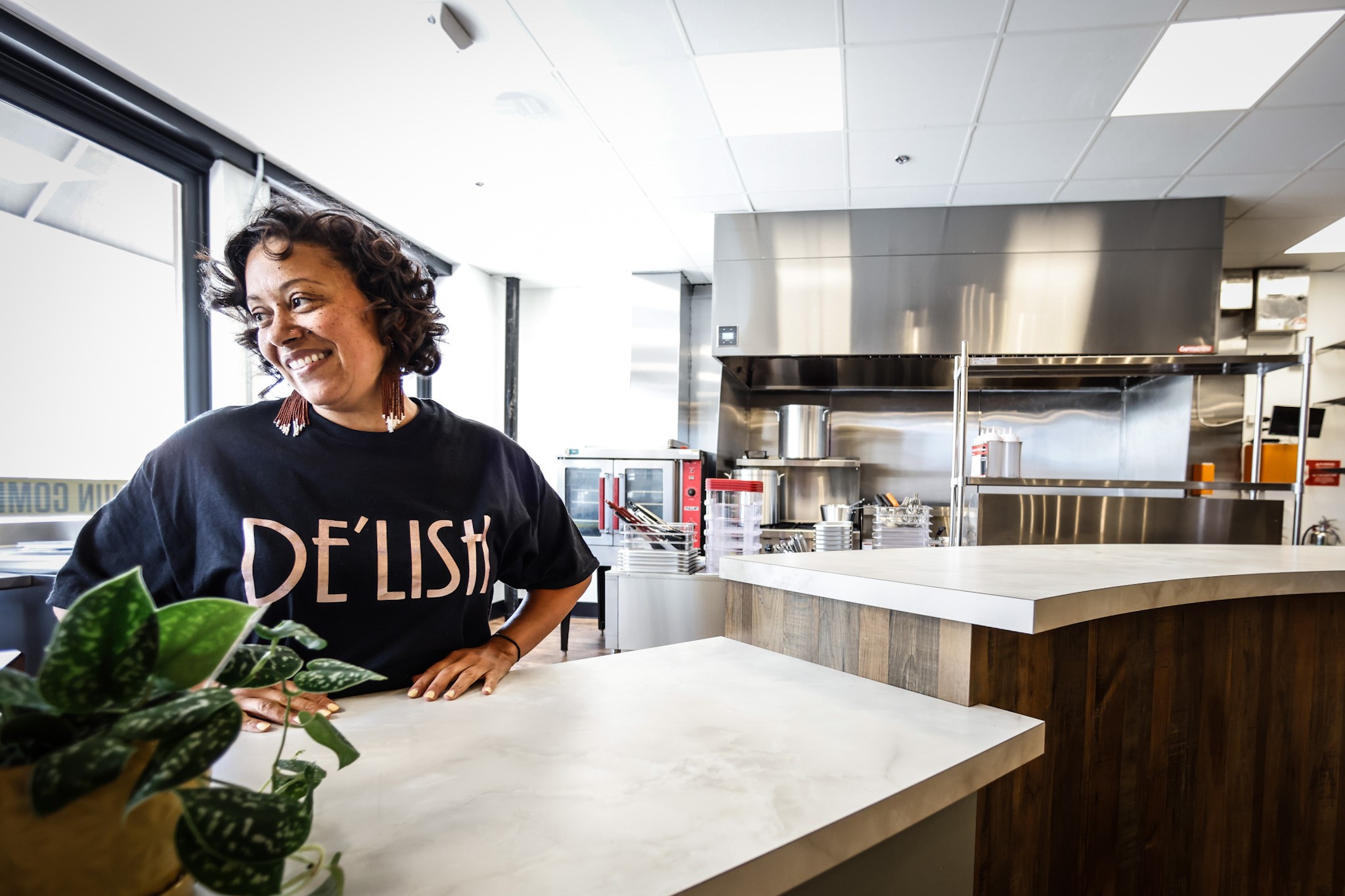 Jasmine Brown is the owner of De'Lish the home of Cajun, creole, comfort food inside West Social Tap and Table which will open July 25th in the Wright-Dunbar Neighborhood. JIM NOELKER/STAFF