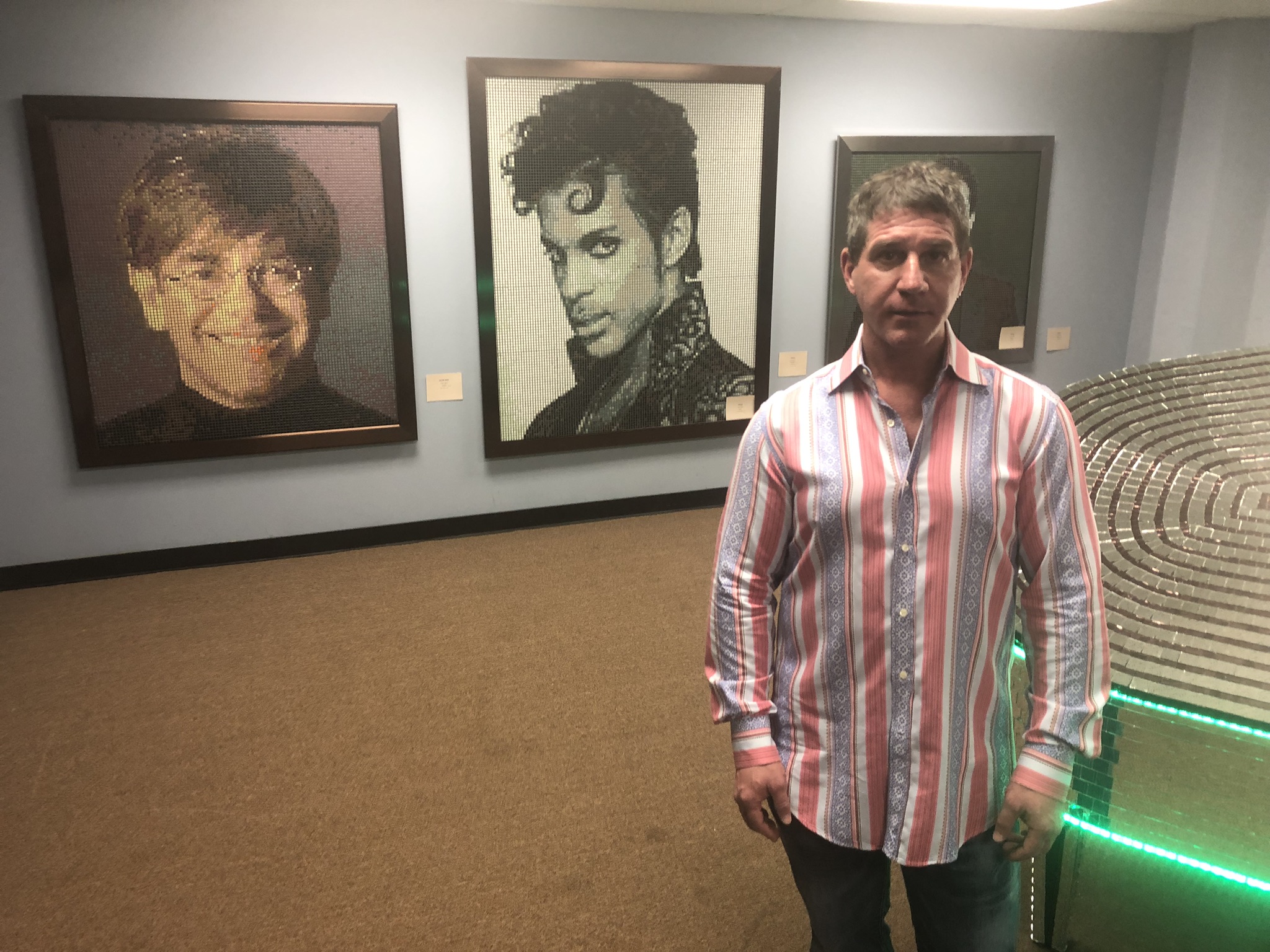 Masque owner Luke Liakos showed off his artwork as part of Downtown Dayton Partnership's First Friday in August. The artwork was displayed above the club opened at 34 N. Jefferson in 2004. Liakos announced in December that he will close the club Jan. 25 and is looking for a new location.