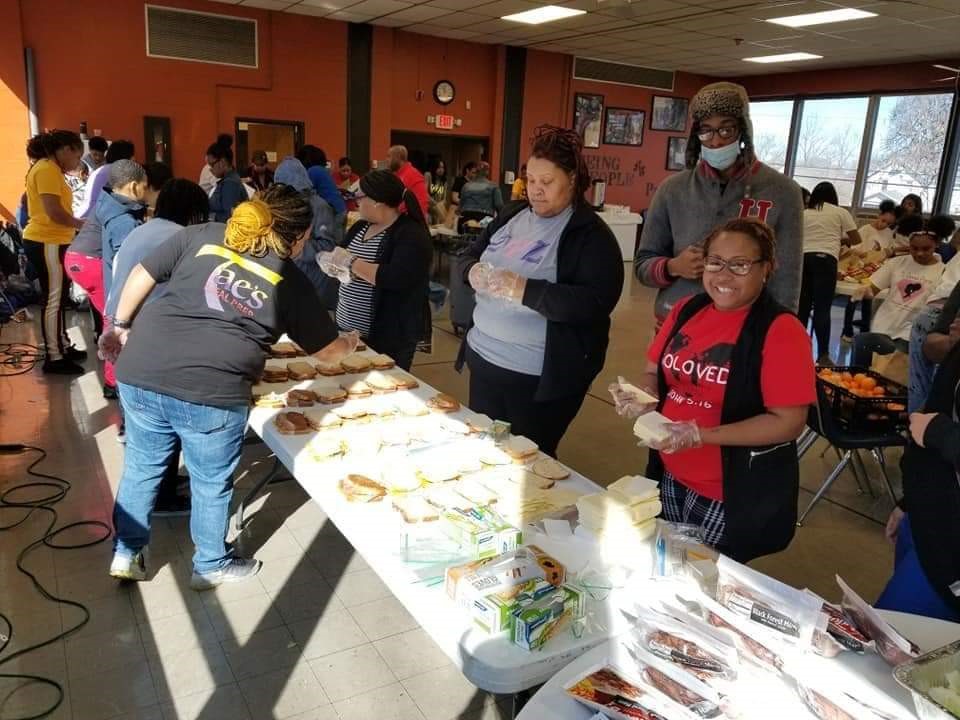 Ashley Browning is the founder of SoLoved, a community organization. She is picturedat Hashtag Lunchbag Dayton Chapter with Jordan Hockett. Brown bag lunches were provided to community members.