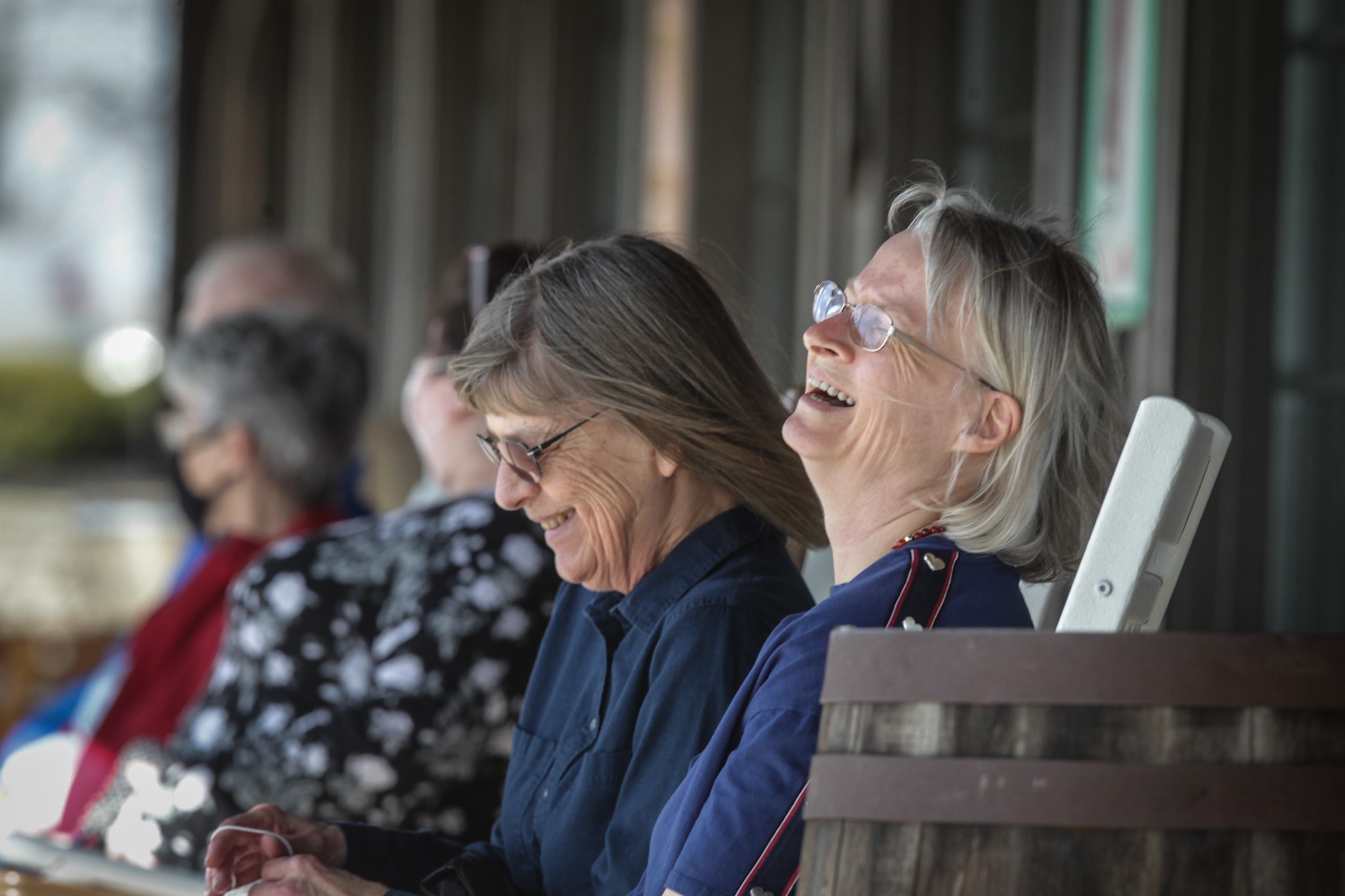 Jeanette Schultz, right and Sue Miller wait for a table at the Crackle Barrel on Wilmington Pike in Centerville Wednesday afternoon March 24, 2021. Both women have been vaccinated and are out for dinner after a year of isolation because of COVID-19.