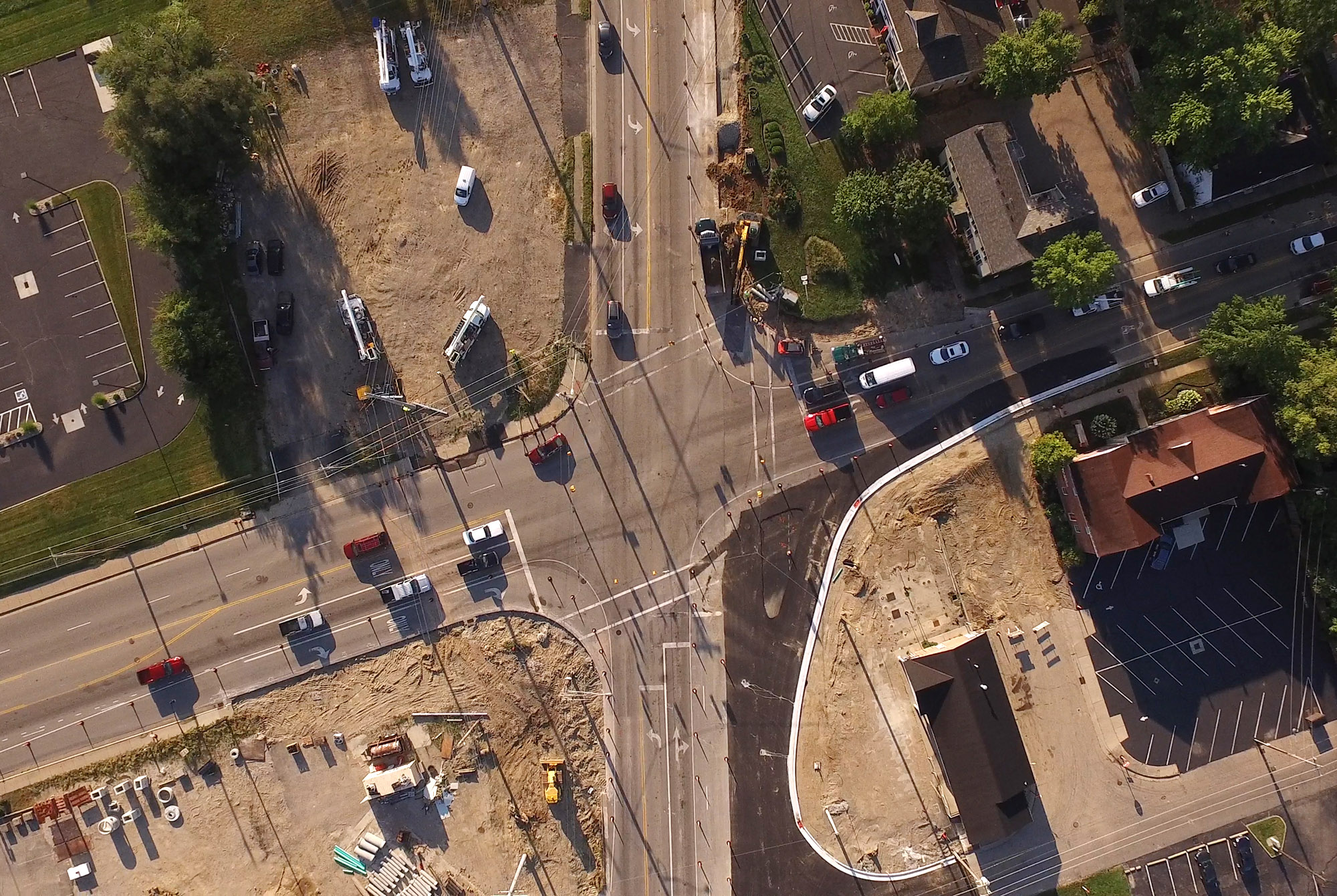 Downtown Springboro is transforming as an old shopping center is razed and a major intersection is widened. TY GREENLEES / STAFF