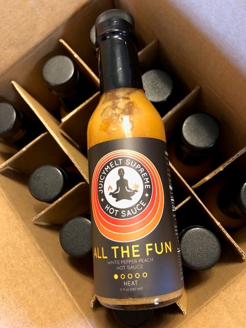 Tracy and Jeffrey McElfresh of Kettering have released JuicyMelt Supreme Hot Sauce. Varieties include Ruby Wizard (grapefruit habanero), OG Catalyst (orange ginger habanero), and All the Fun (white pepper peach).
