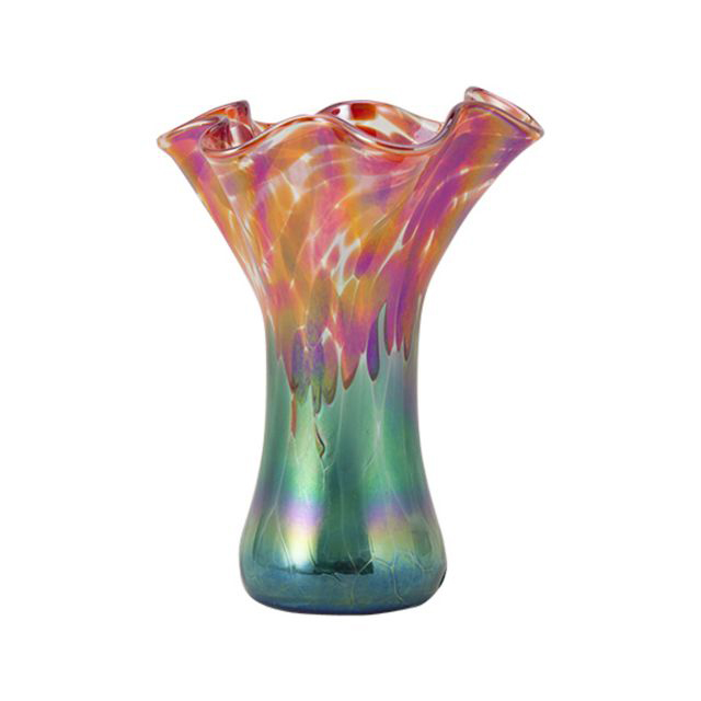 Poppies Mini Ruffle Vase by Glass Eye Studio: $59 Make a sweet statement with this handmade vase, created by Glass Eye Studio in Seattle, Washington. Ready for fresh cut florals or perfect to display by itself. Founded in 1978, Seattleâs Glass Eye Studio is one of the oldest and largest privately-owned hot shops in the country and has served as a training ground for some of the most famed glass artists of the Pacific Northwest. (Approximately 6" High)