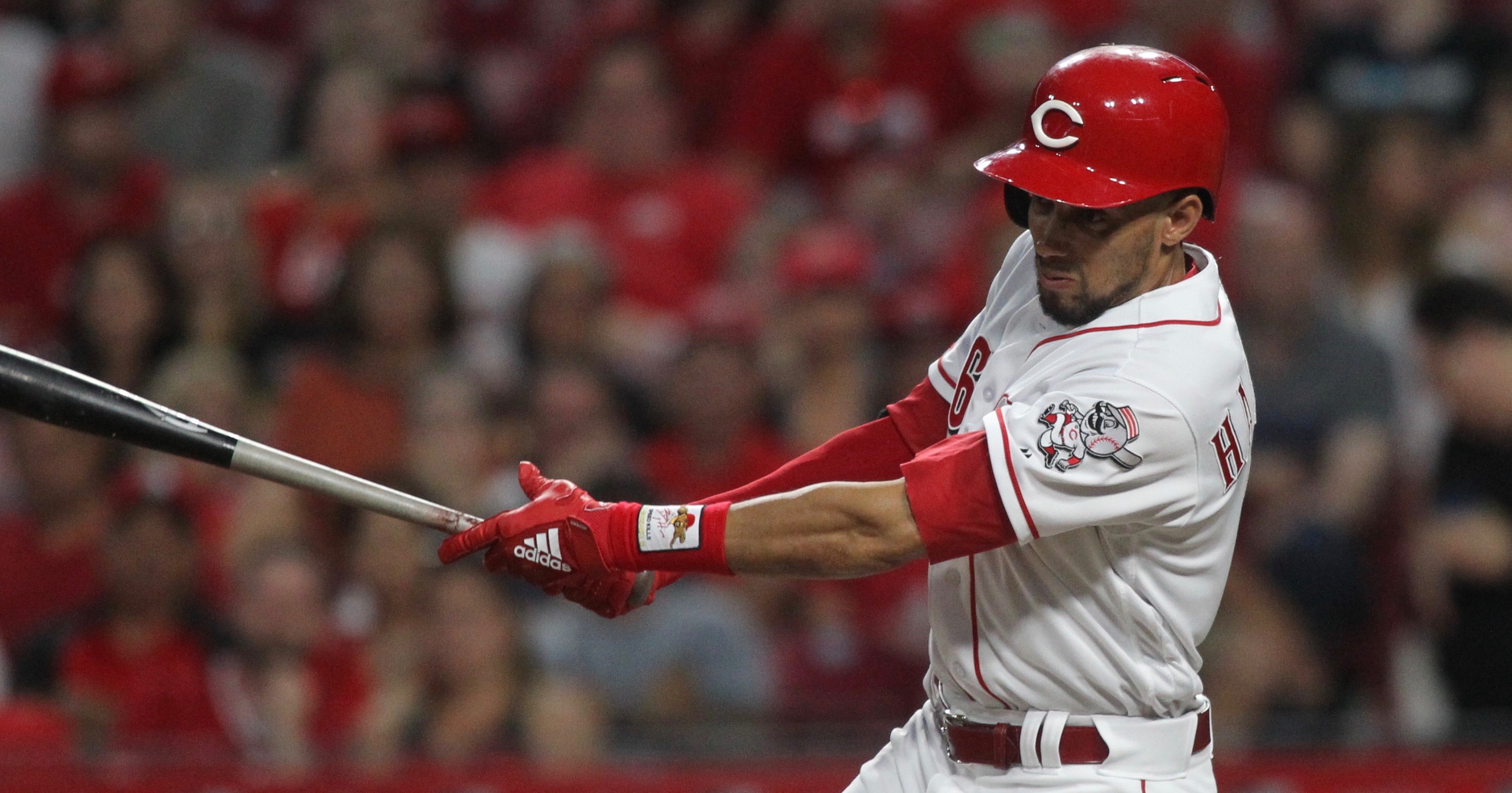 Cincinnati Reds' Billy Hamilton, left, and Eugenio Suarez, right