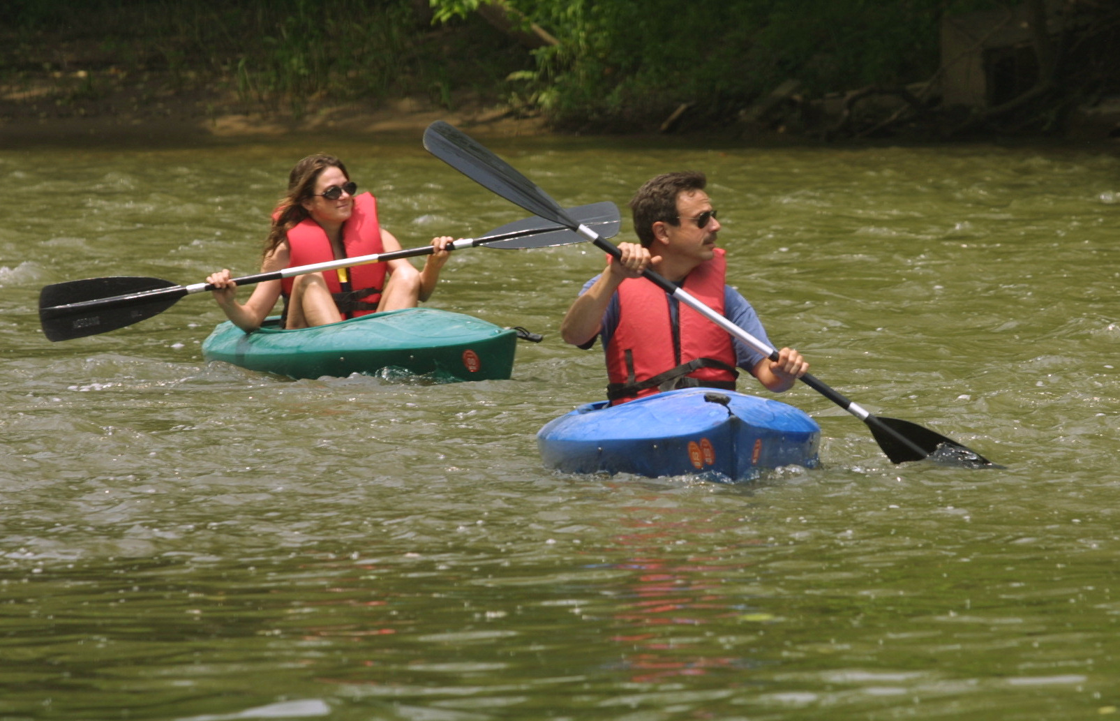 Lori Schultz, left, and Brian Coniglio enjoy a leisurely kayak trip on the Little Miami River. "Its great. There is nobody out here," Coniglio said. "I'm ready for more," Schultz added. TY GREENLEES / STAFF