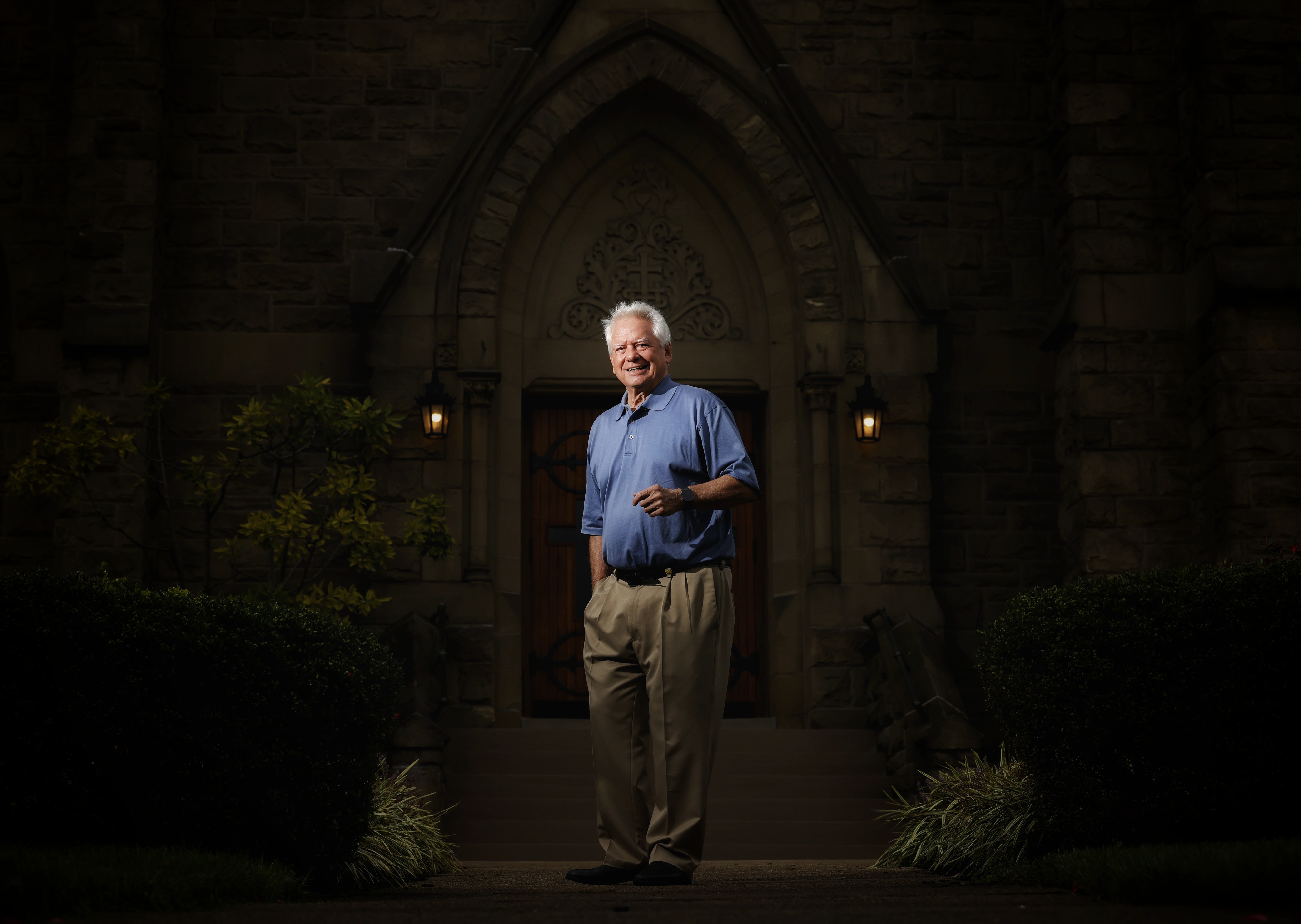 Fr. John Civille stands outside Holy Trinity Church Wednesday, Sept. 22, 2021on Clark Street in Middletown where he has been a pastor for nearly 30 years as part of the Holy Family Parish. NICK GRAHAM / STAFF