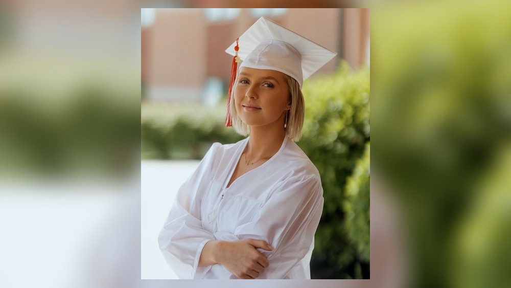 After extensive chemotherapy Mattie Cole now has a Madison High School diploma in her hand as she approaches the two-year anniversary of her last treatment. She plans to study radiology at Sinclair Community College. (Provided Photo\Journal-News)