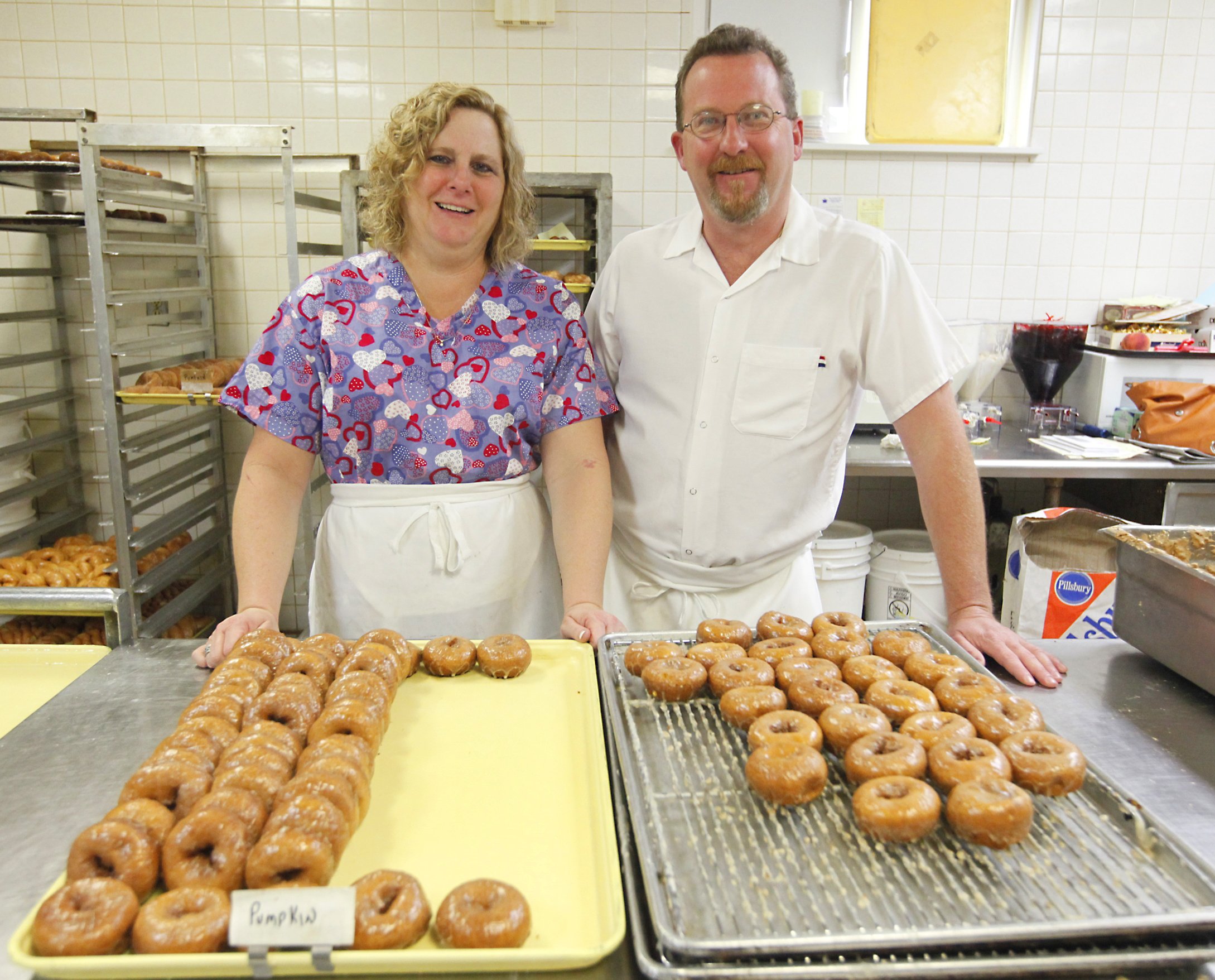 Bell's Donut Shop, 268 North, Saint Centerville owners, Lisa Tucker and Jim Elam are in the kitchen.  Cakes are popularly served far and near.  Staff photo by Jim Witmer