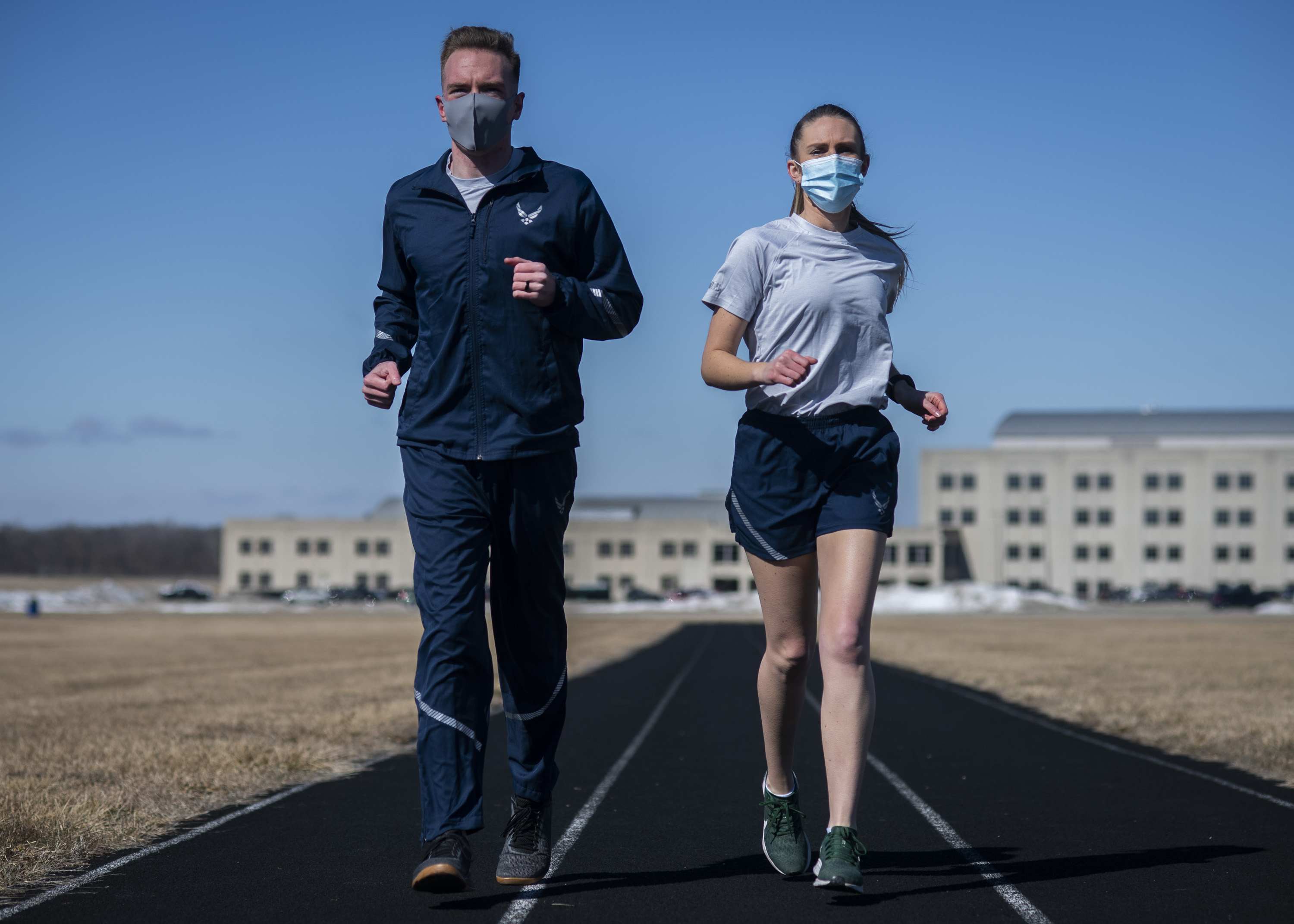 Air Force Uniform Office members 1st Lt. Avery Thompson and 2nd Lt. Maverick Wilhite put updated versions of the Air Force phyisical training (PT) uniform through their paces at Wright-Patterson Air Force Base. (U.S. Air Force photo by Jim Varhegyi)