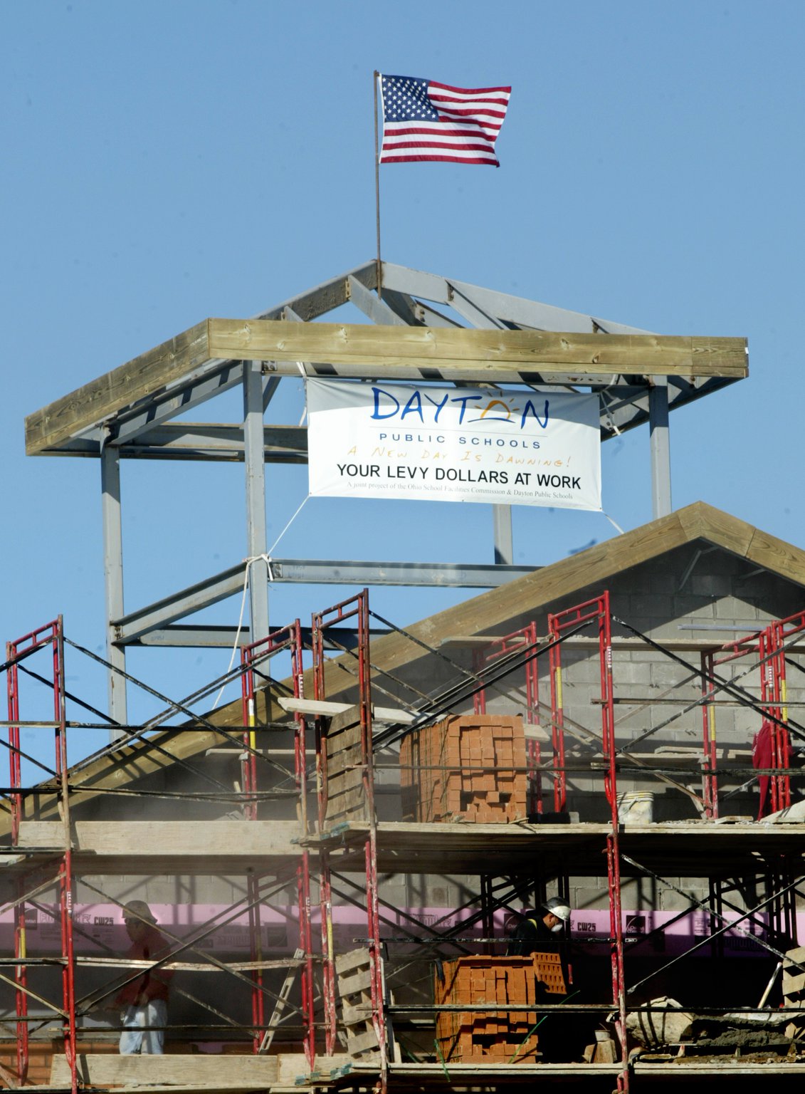 The final steel beam of the new Wogaman school on Germantown Street was hoisted into place in January 2006. Nearly 14 years later, Dayton Public Schools officials are weighing how much to spend for maintenance on their relatively new schools. PHOTO BY JAN UNDERWOOD
