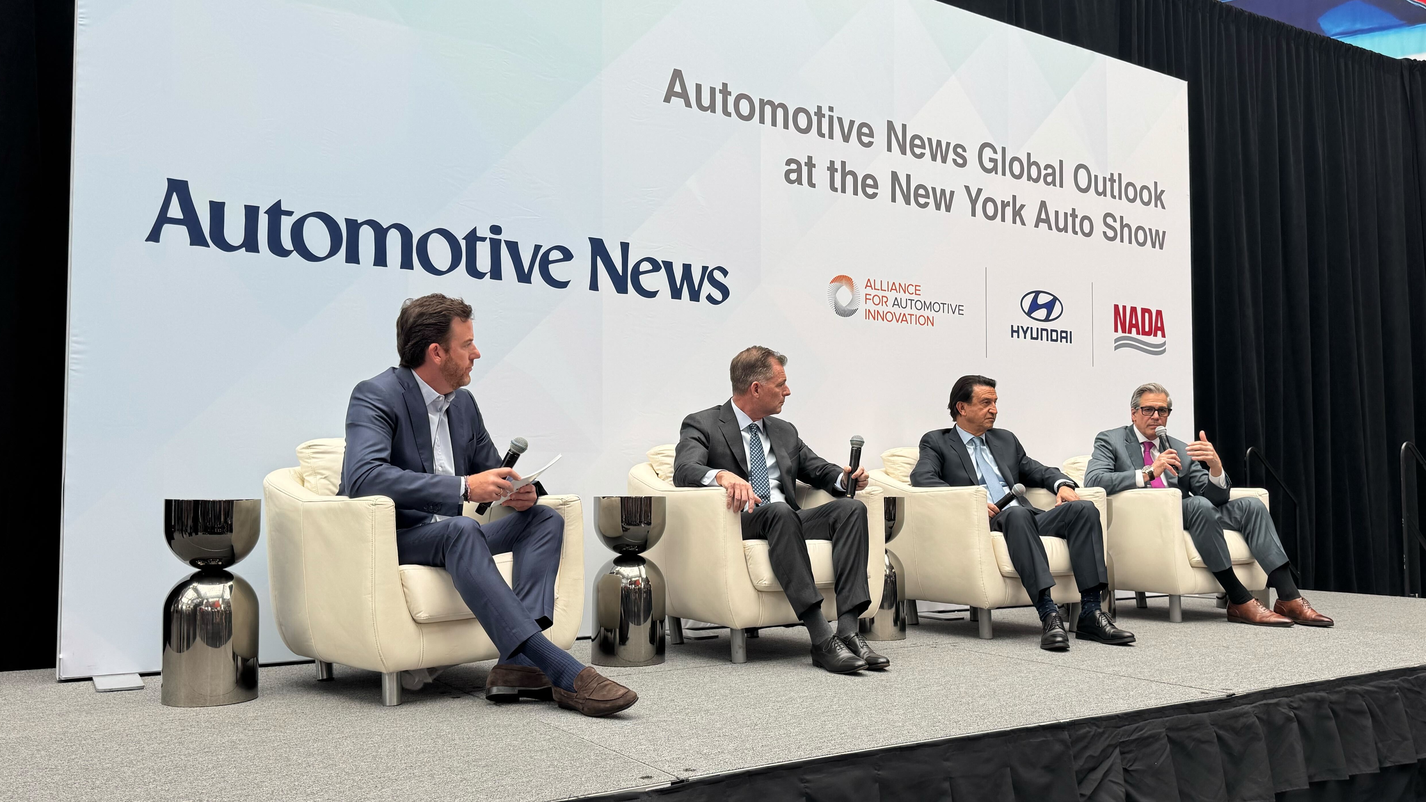 As China threatens, auto industry needs stable policies, more localized production, execs say
