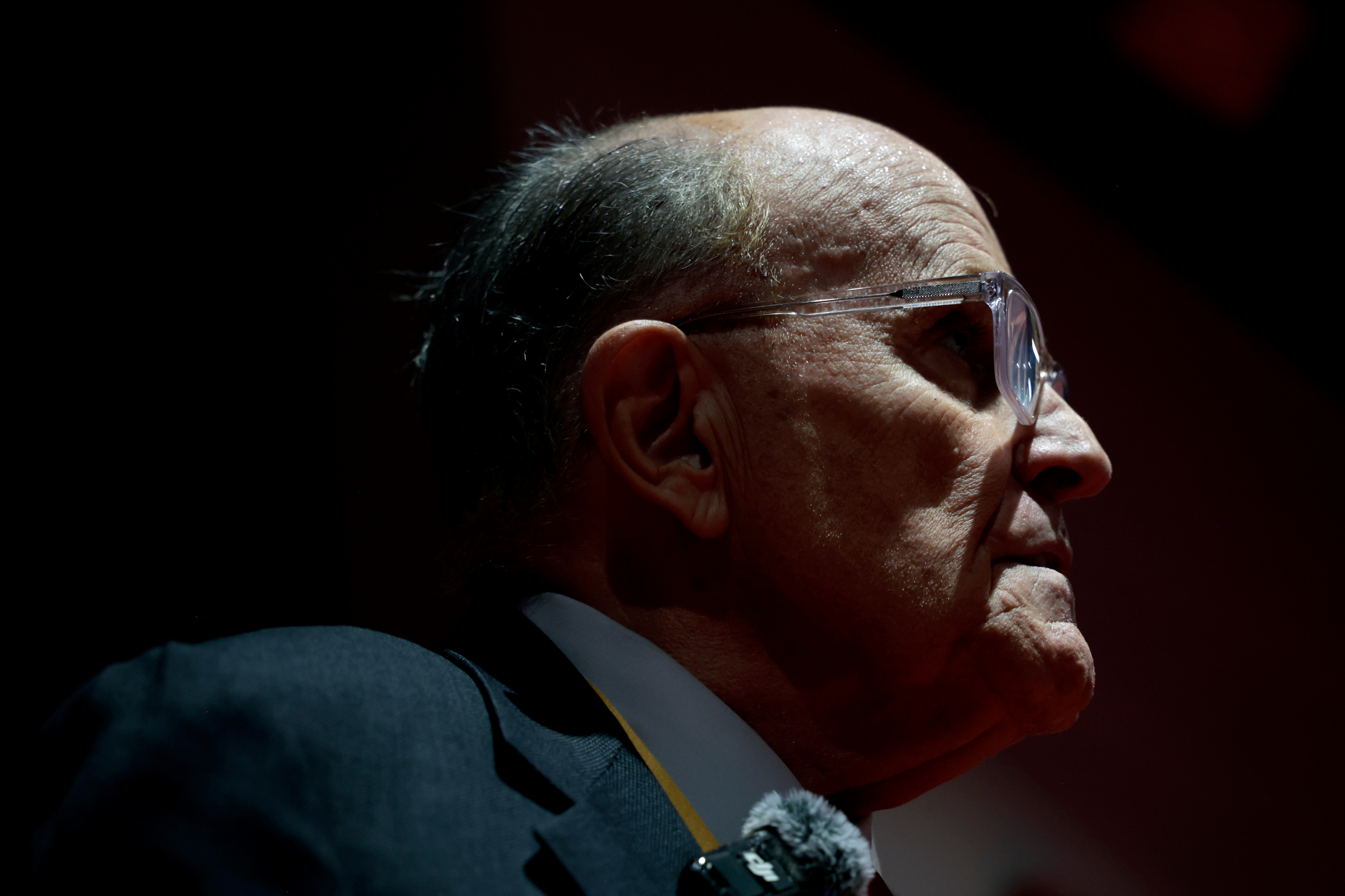 Rudy Giuliani, battling pneumonia, remains critical but breathing on his own