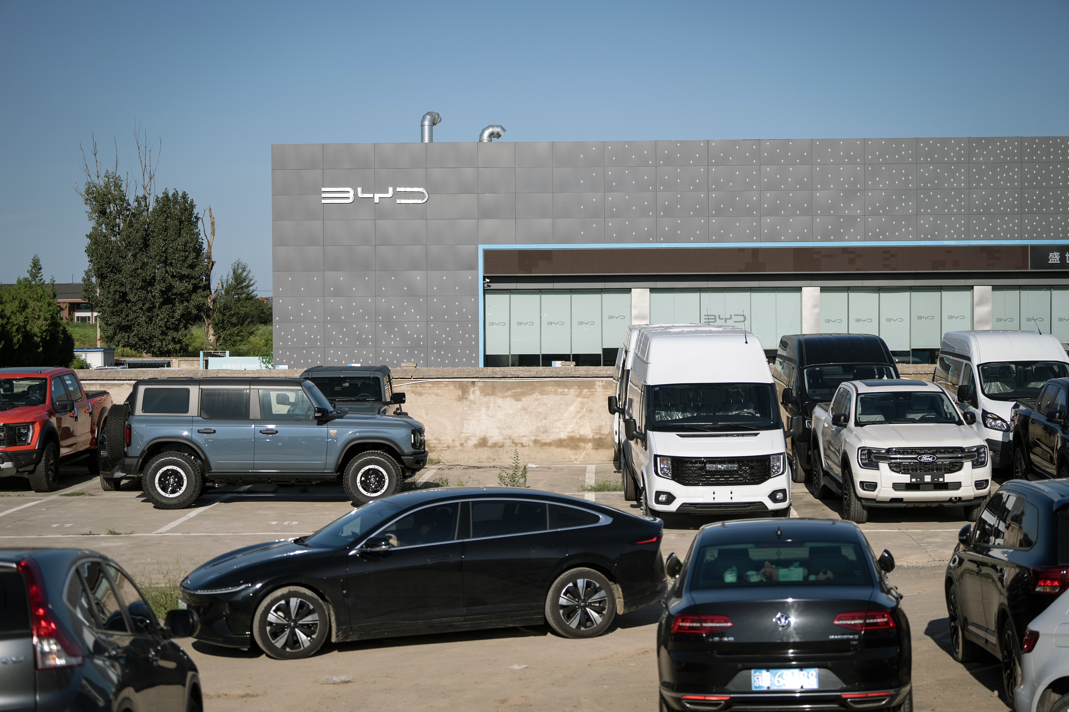 U.S. lags China and Europe in EV adoption, McKinsey survey shows ...