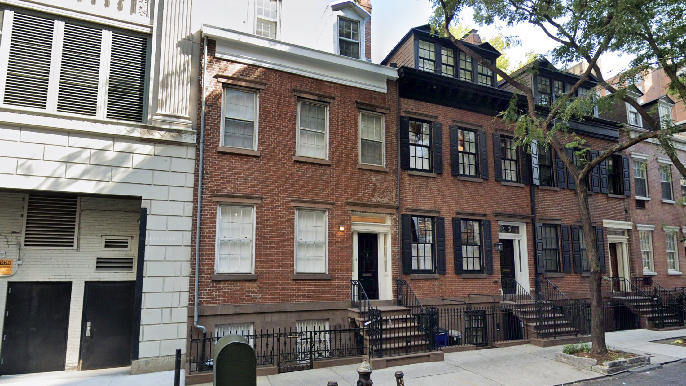 Husband-and-wife sculptor and poet sell Hudson Square townhouse