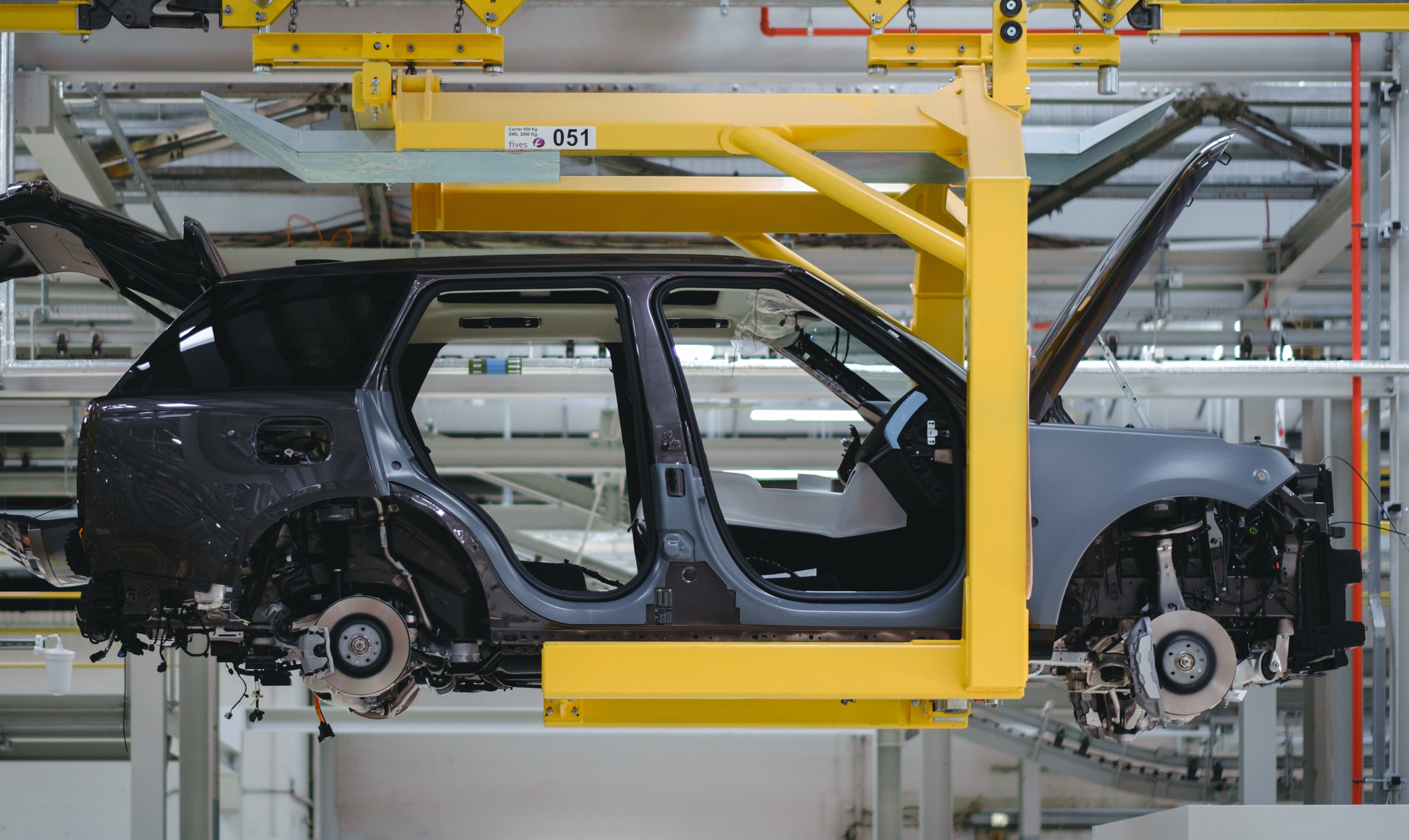 Jaguar Land Rover suspends production at UK plant for up to two weeks