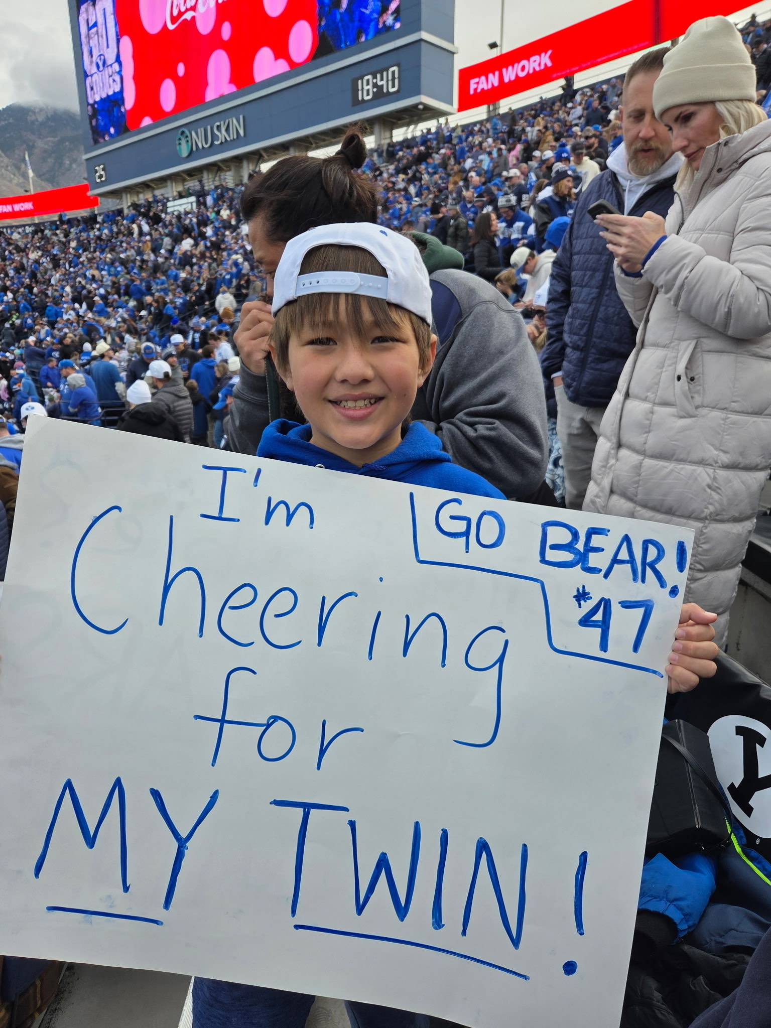 Image for ‘I’m cheering for my twin!’ How this young BYU fan caught Bear Bachmeier’s attention