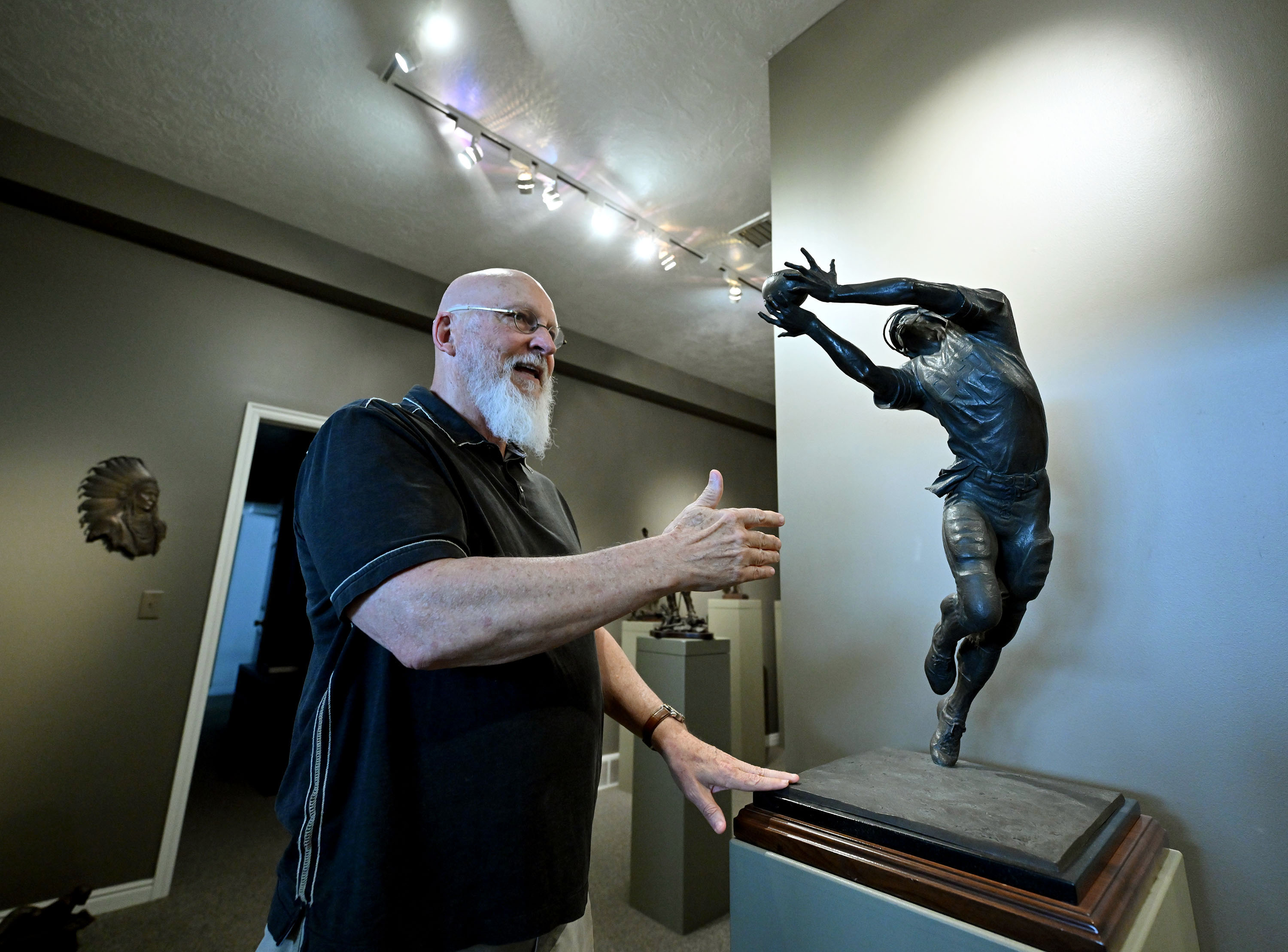 Capturing beloved faith and football heroes in bronze – Deseret News