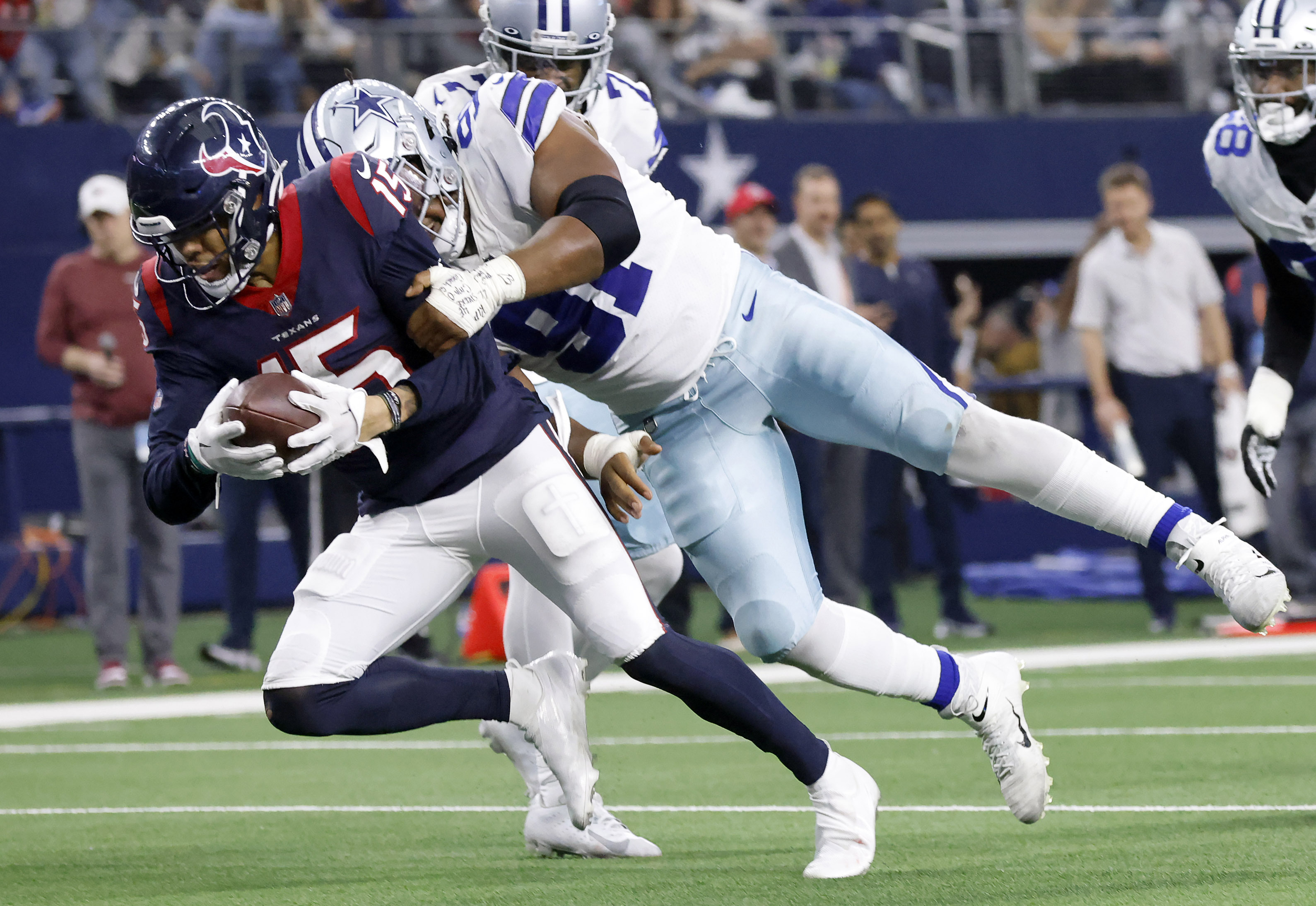 Dallas Cowboys defensive tackle Carlos Watkins (91) runs onto the