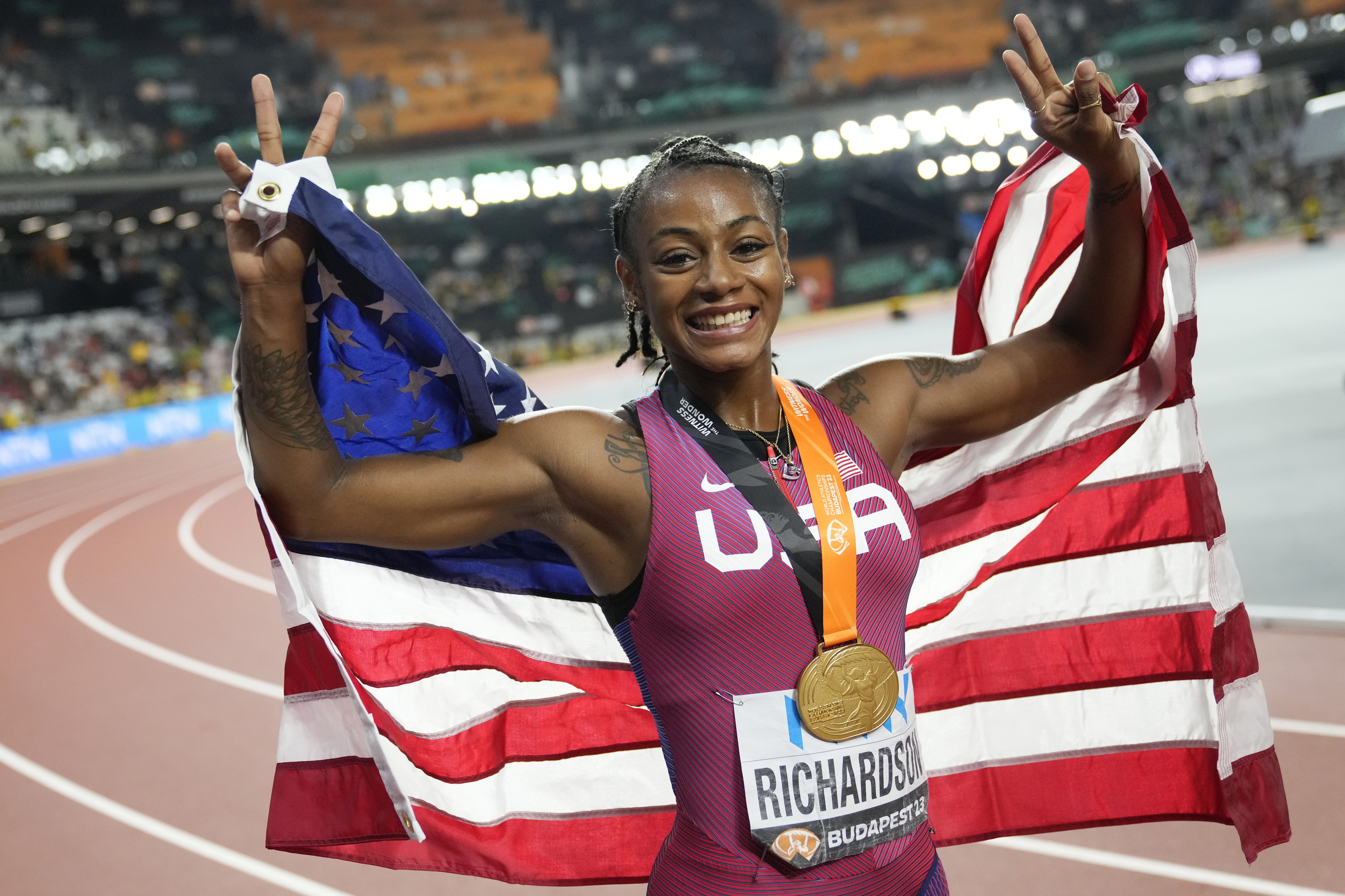 Dallas' Sha'Carri Richardson wins wild 100m final to become world