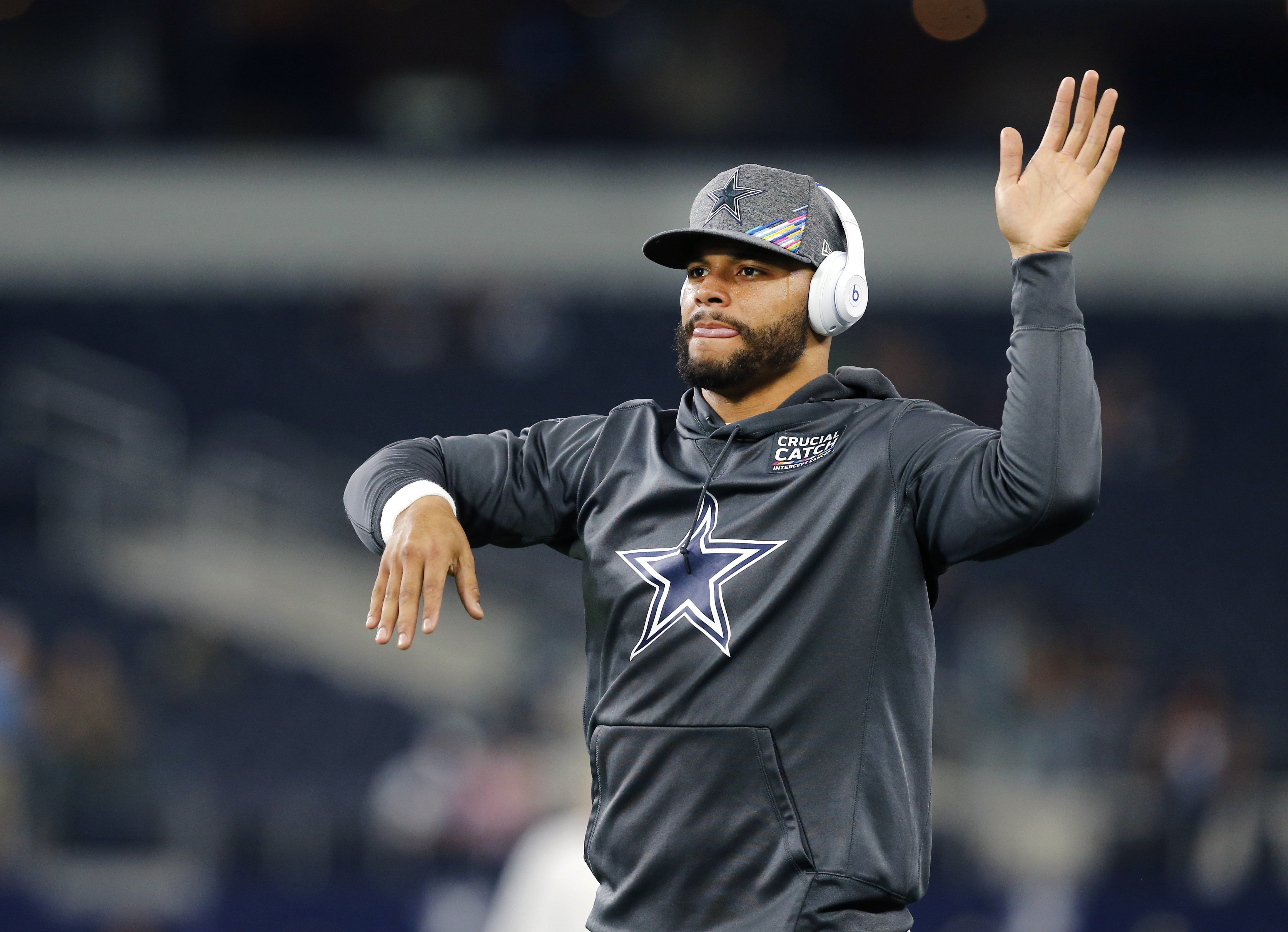 Dallas Cowboys quarterback Dak Prescott participates in warm ups before an NFL  preseason footba …