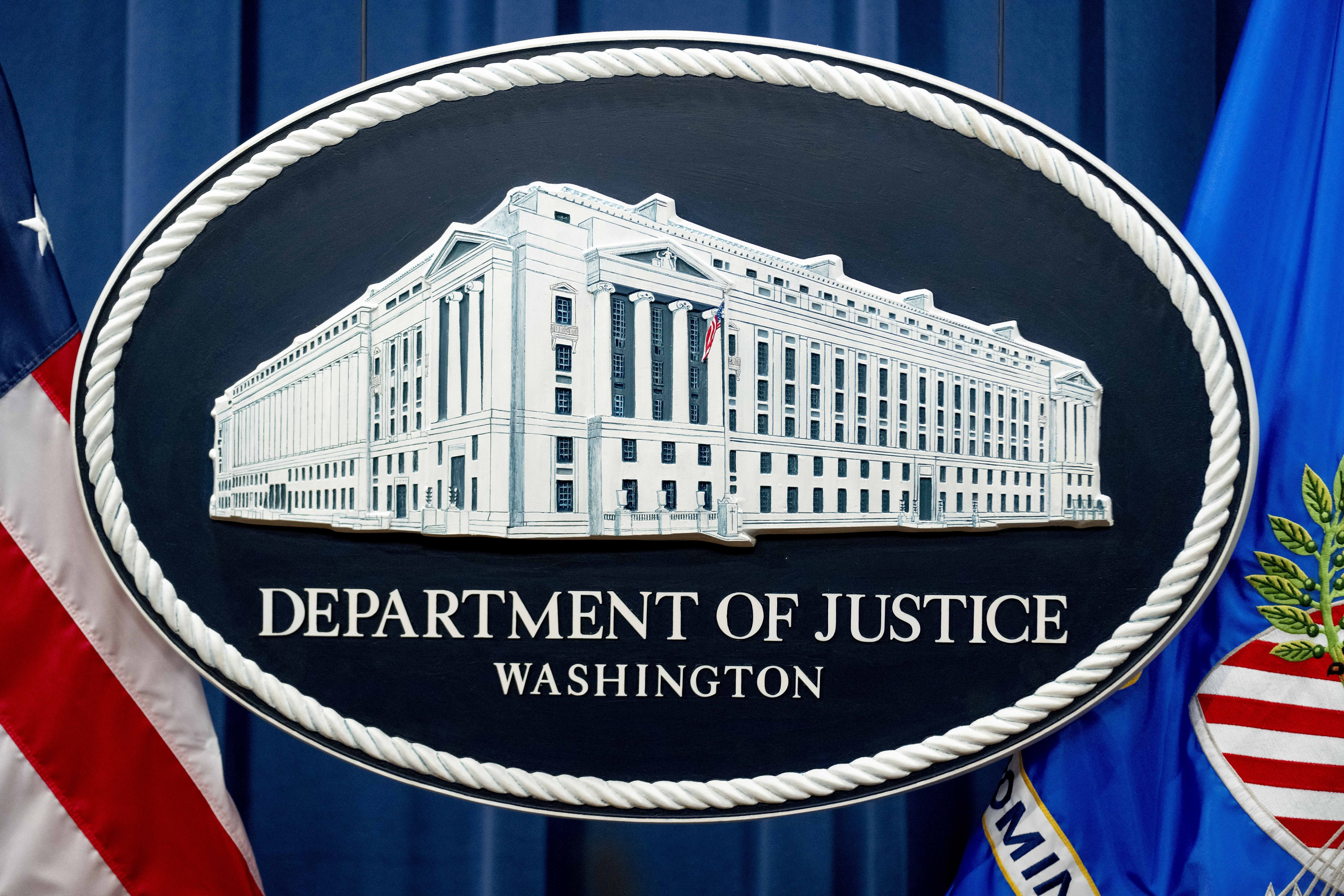 FILE - A U.S. Department of Justice sign is seen, Nov. 18, 2022, in Washington.