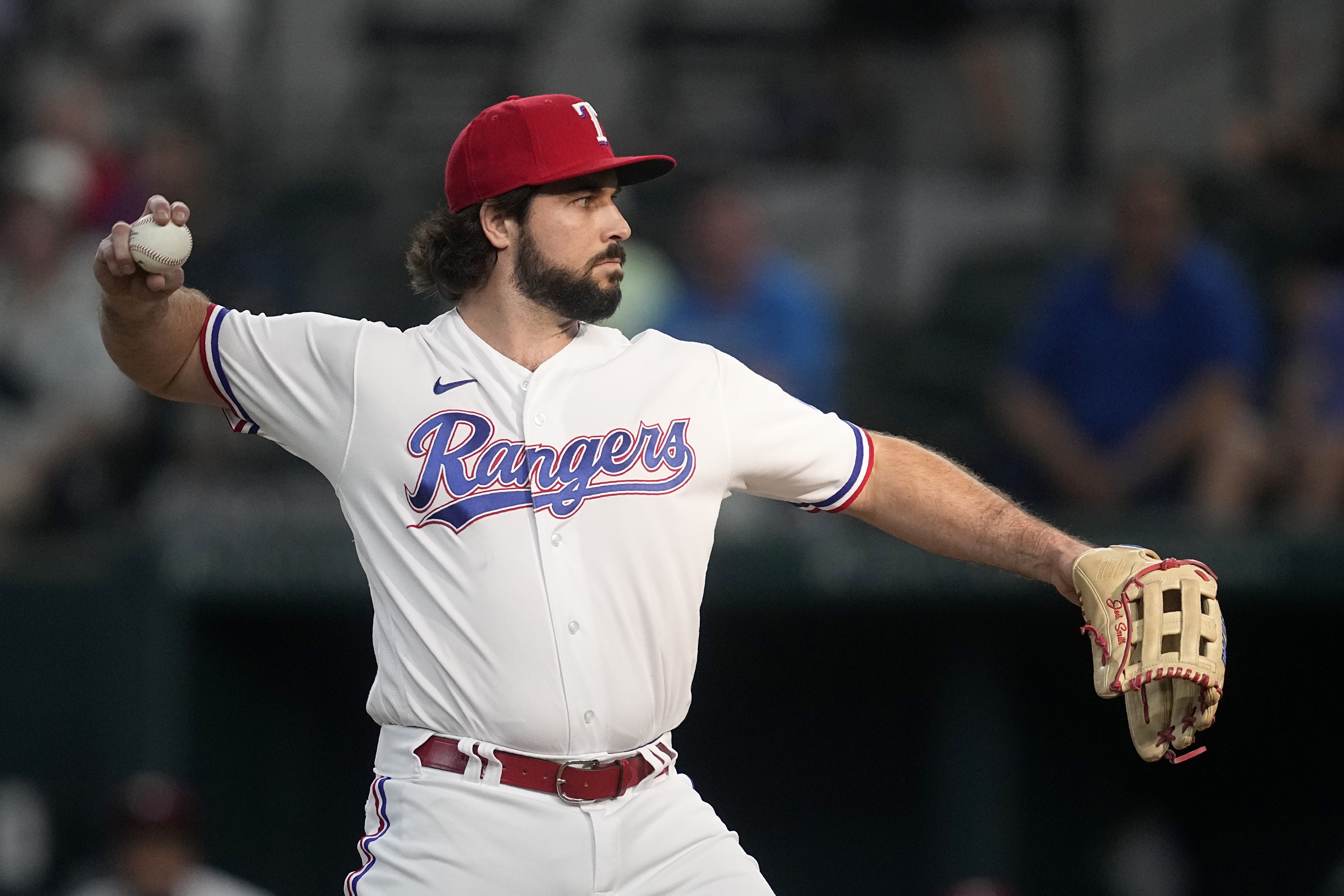 Nationals use power, pitching to down Rangers