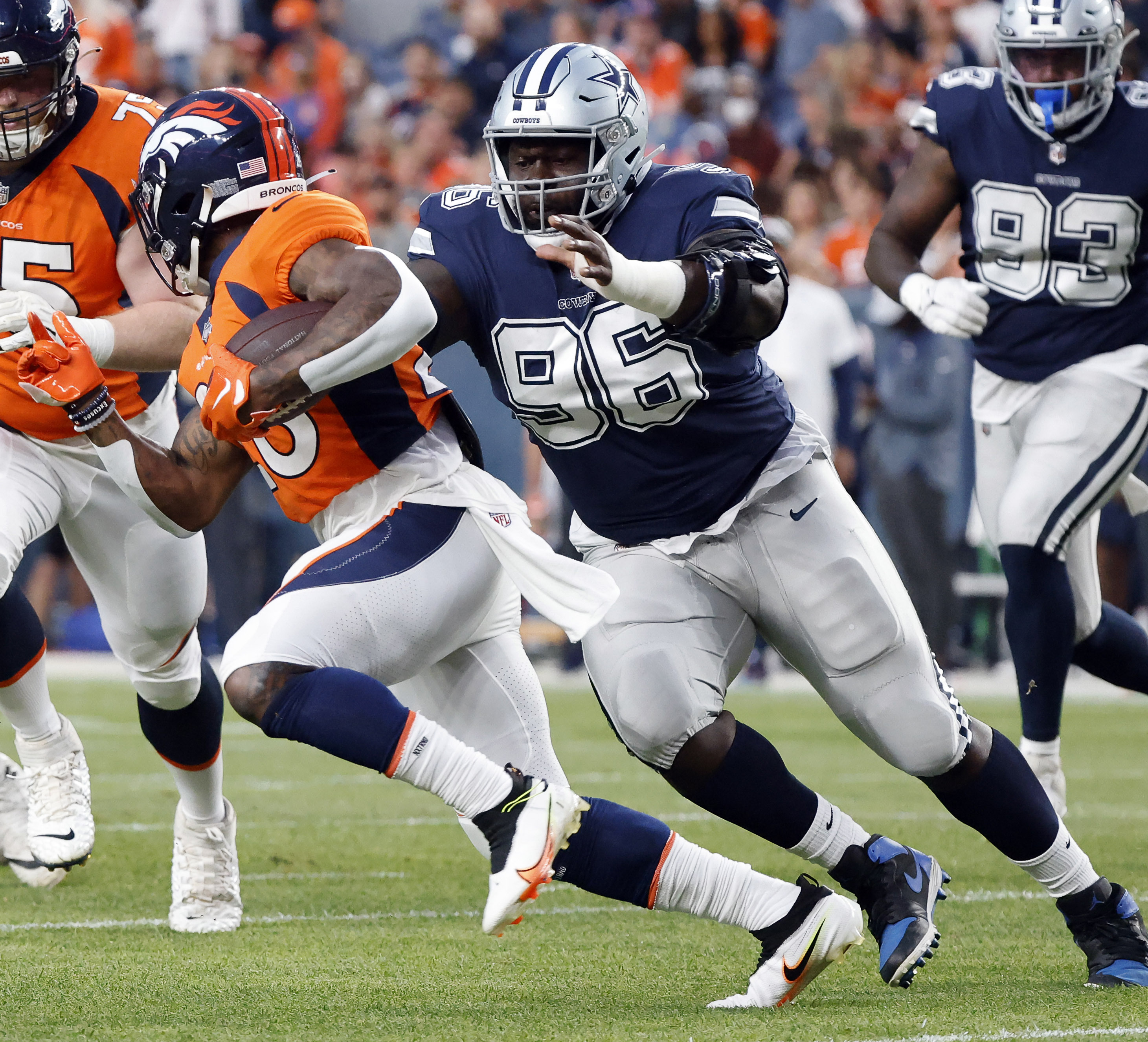 Dallas Cowboys defensive tackle Neville Gallimore (96) celebrates with fans  after an NFL football game against the New York Giants, Sunday, Dec. 19,  2021, in East Rutherford, N.J. The Dallas Cowboys defeated