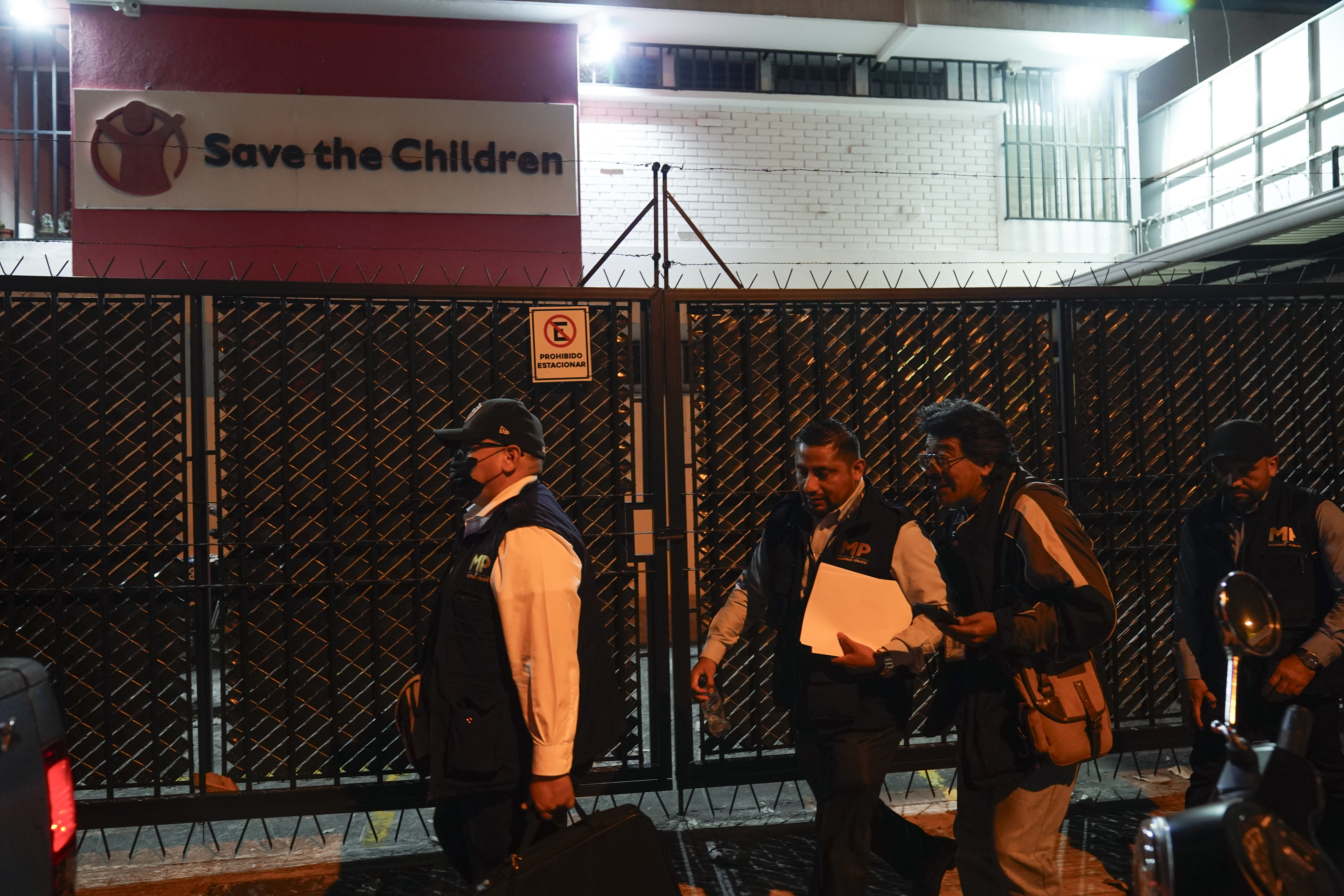 Agents from Guatemala's attorney general's office leave Save the Children's offices  after...