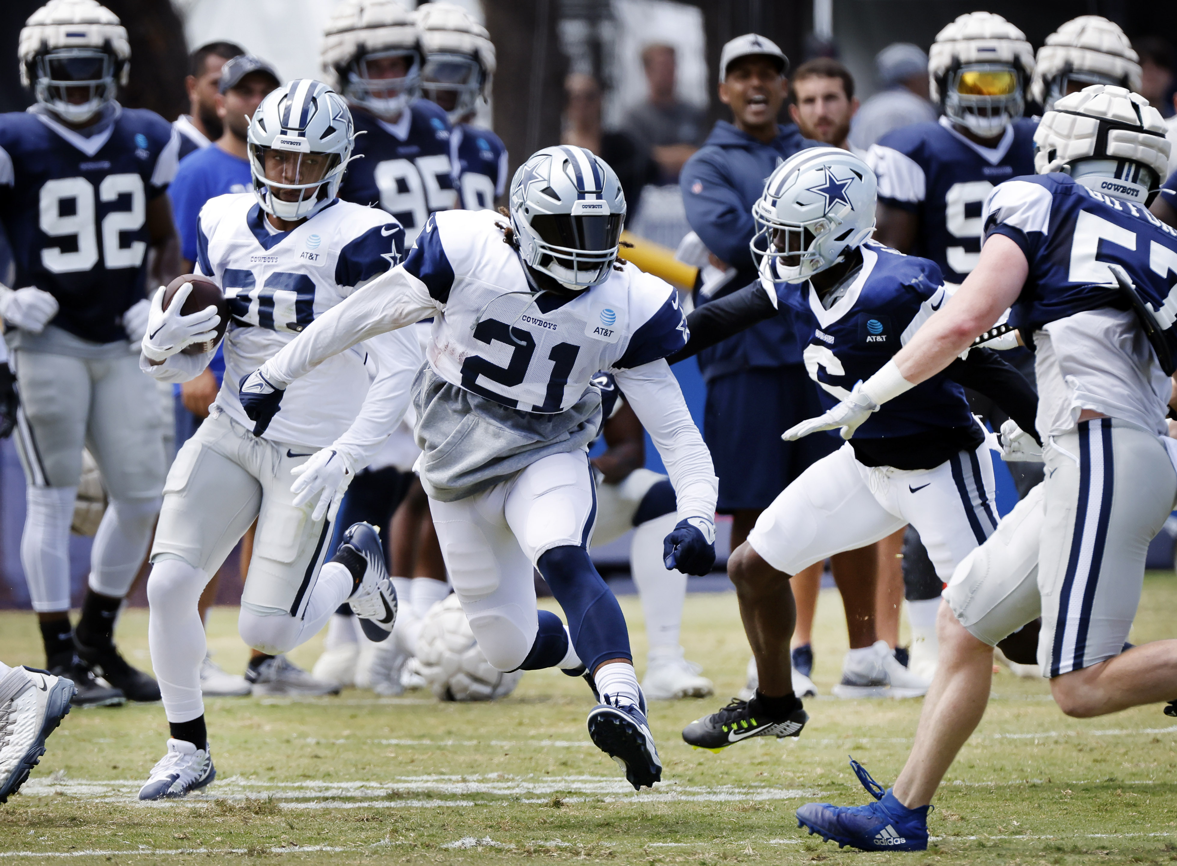 Inside Ezekiel Elliott's first day back with the Cowboys, from  early-morning contract news to reuniting with his team