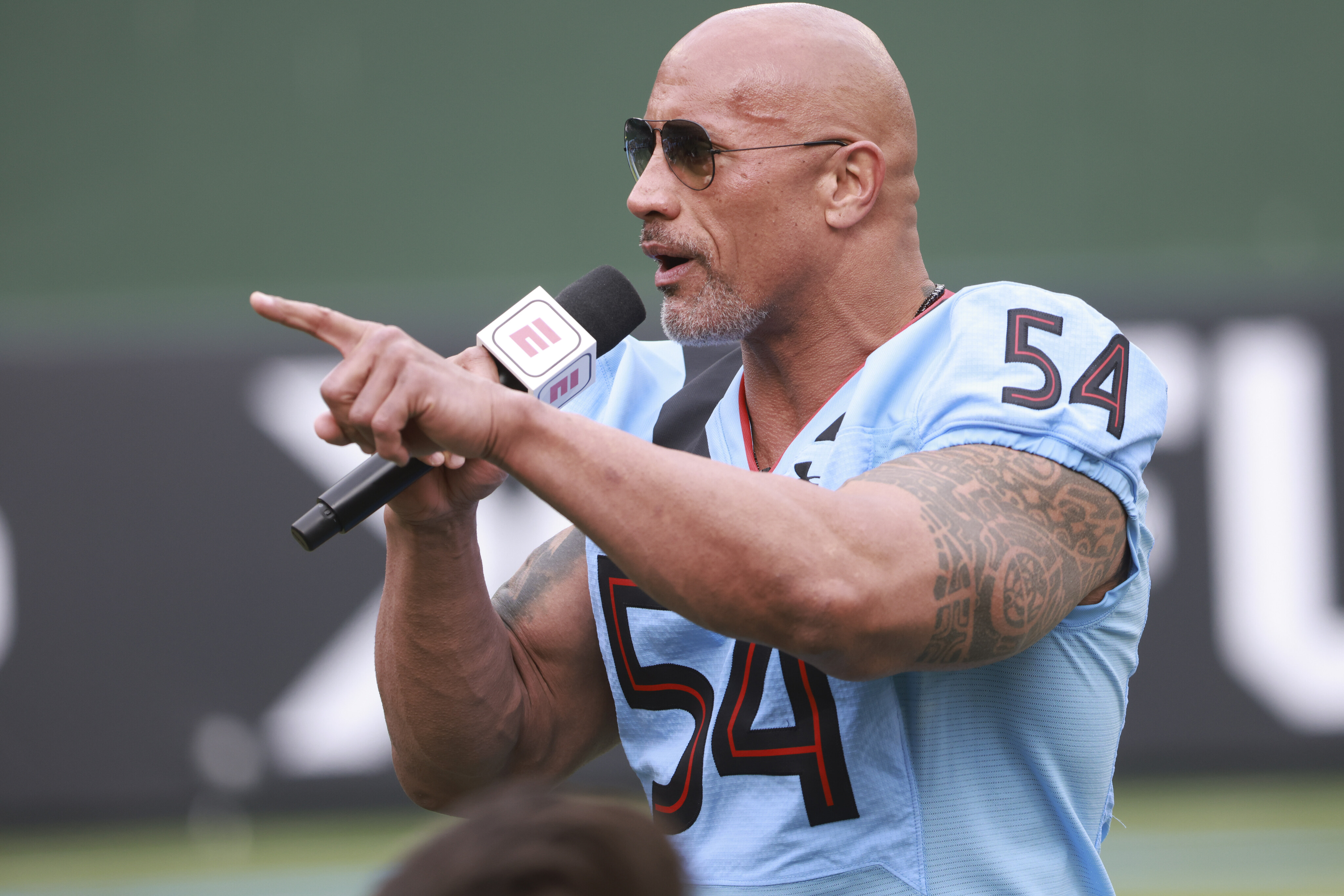 Hello, win column (and The Rock, too): See photos of the Arlington ...